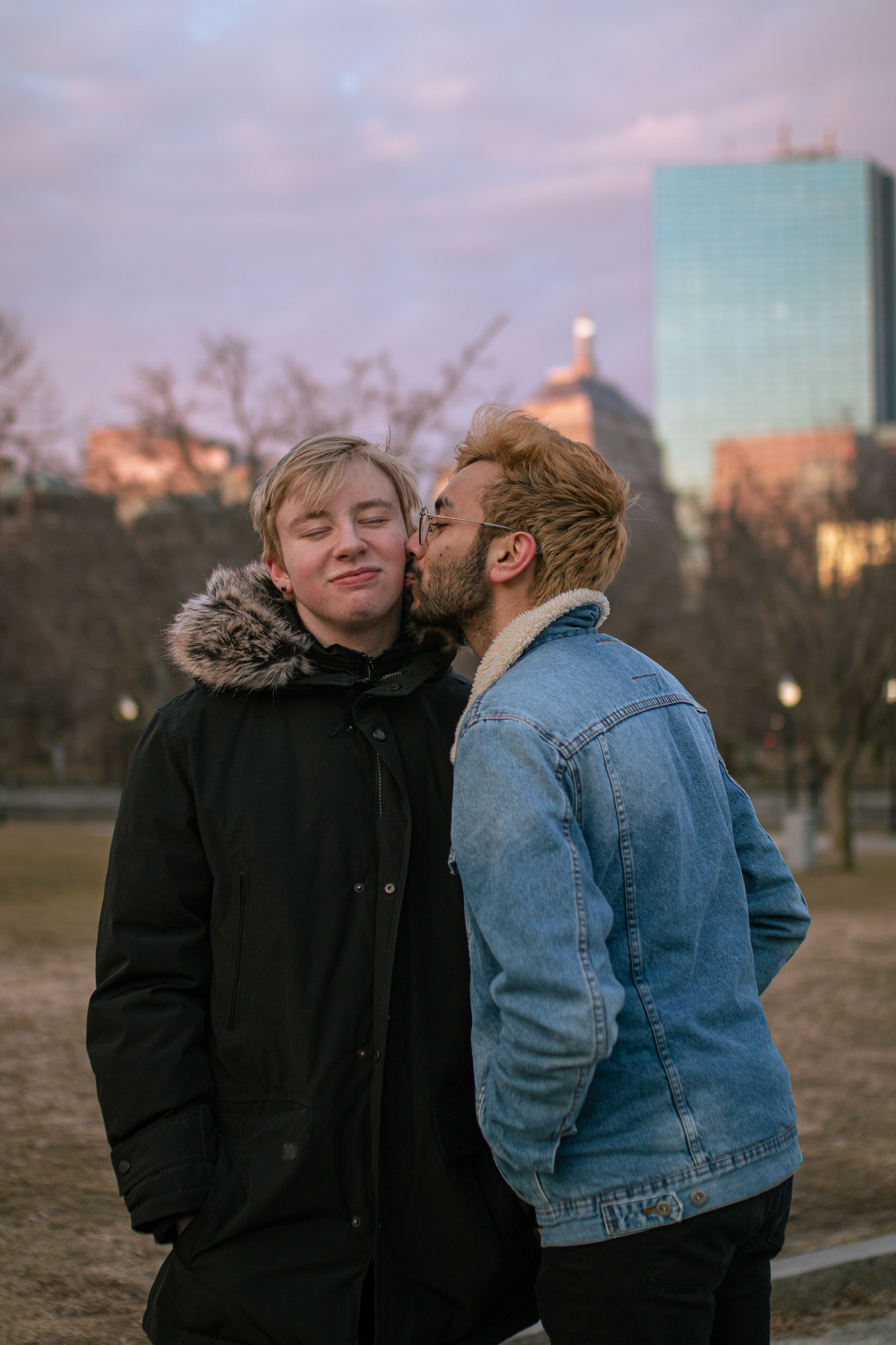 Delilah Sockett, 19, left, and Ahad Khatau, 19, stand together in the early morning light before sunrise on March 21, 2019.