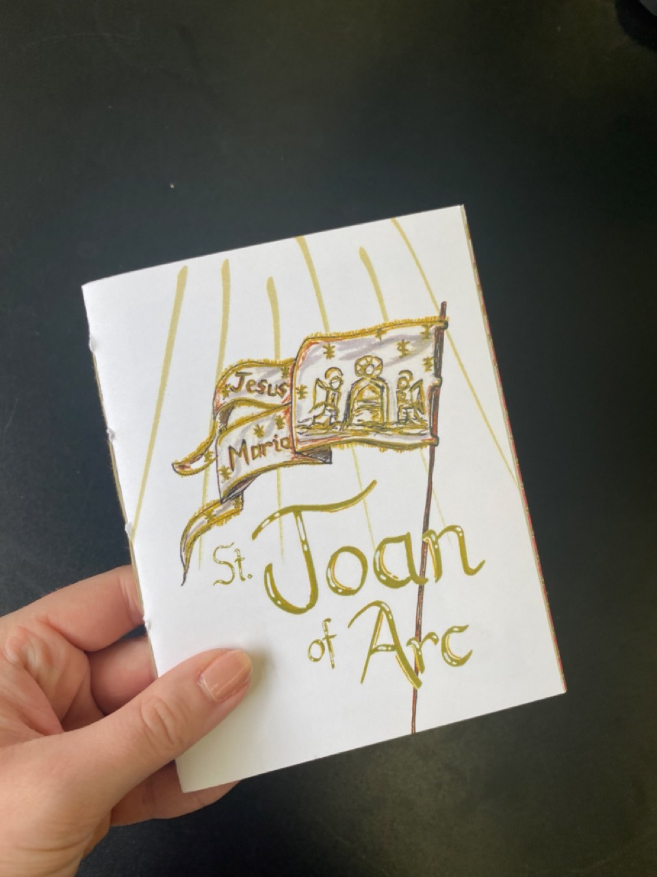 The banner St. Joan marched into battle with.