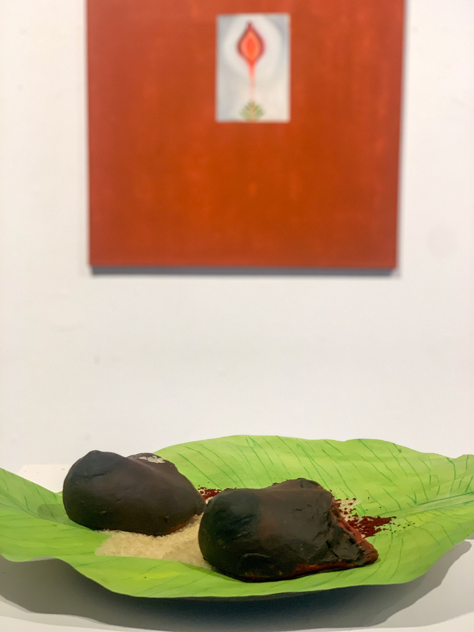 The Price of Dignity, 2025, Clay, banana leaf, rice, and natural pigments
