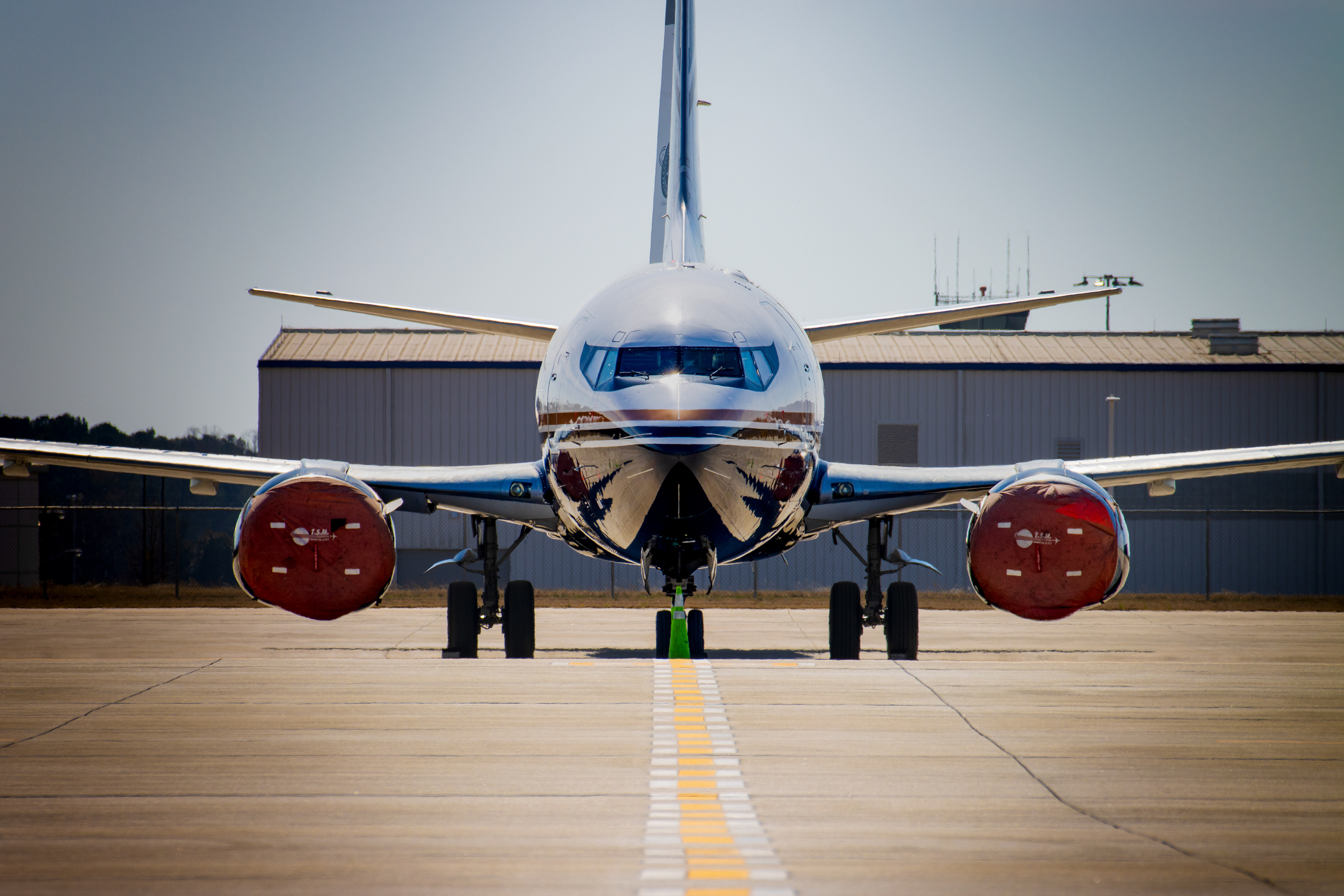 Plane parked on apron.