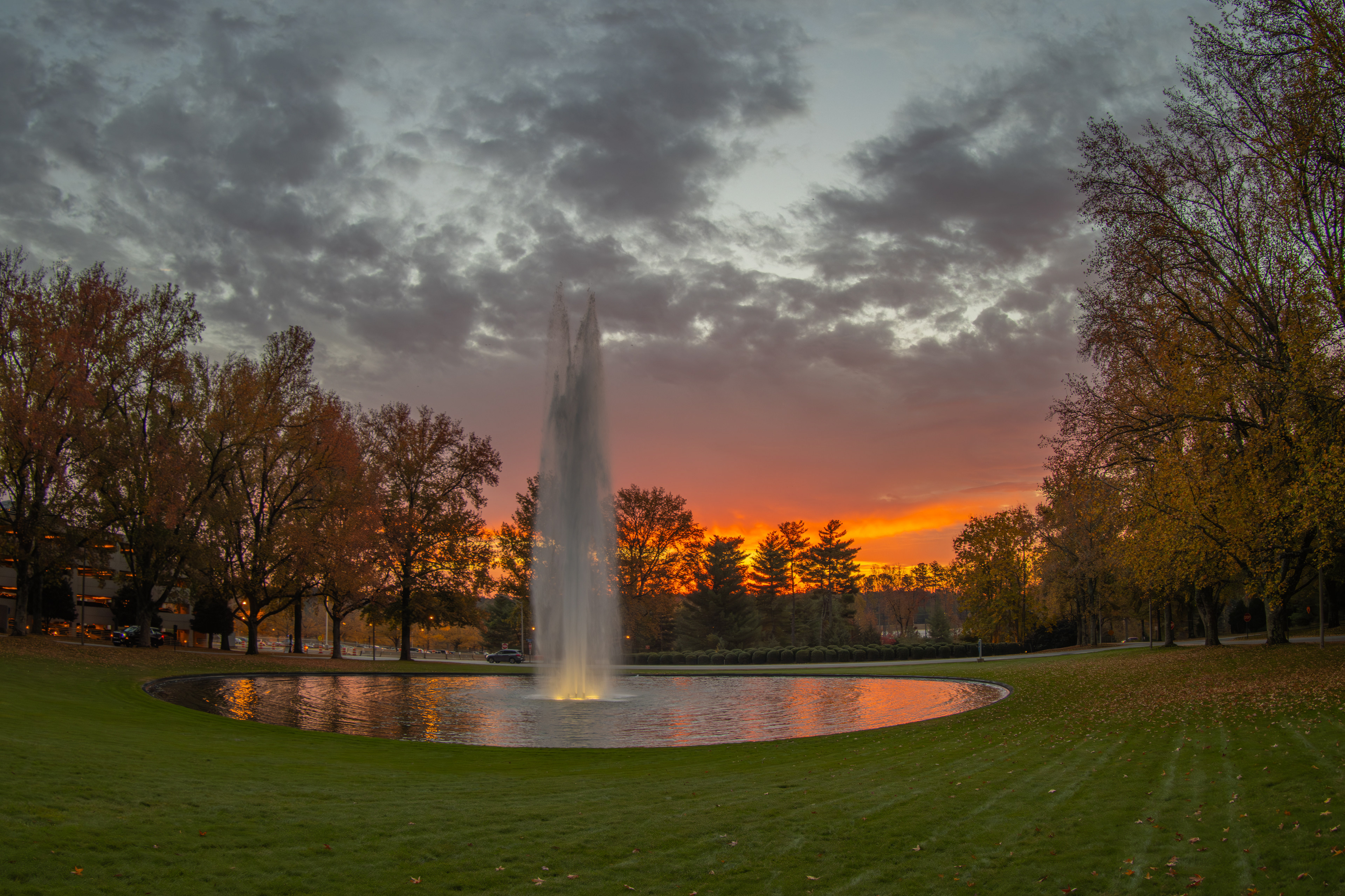Older picture of GSP's front lawn fountain during sunrise.
