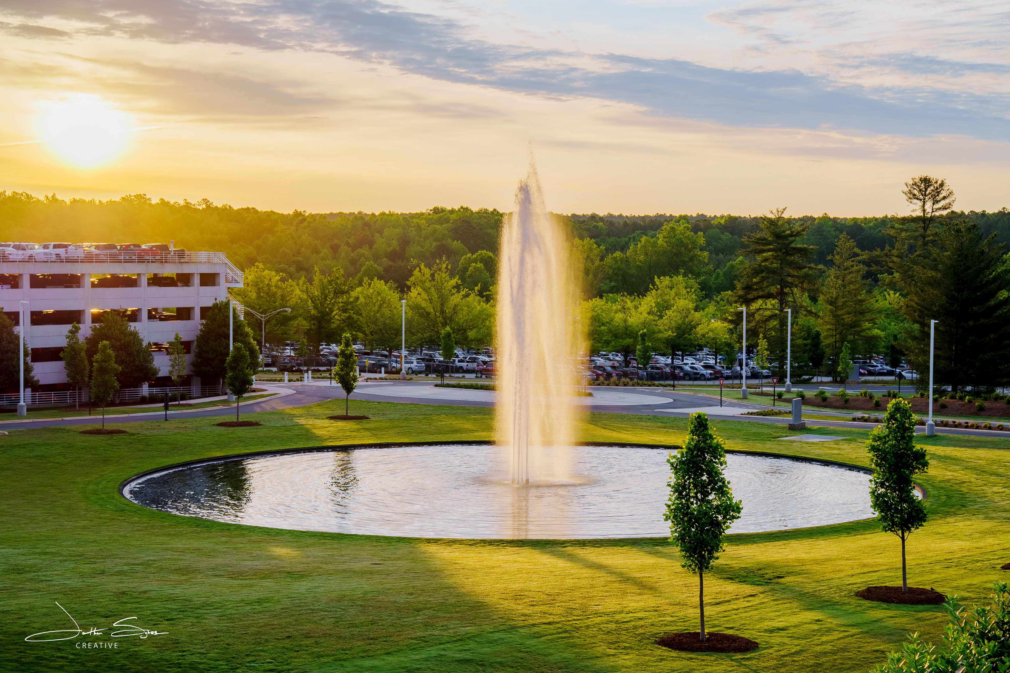 Front lawn fountain at GSP during sunrise.