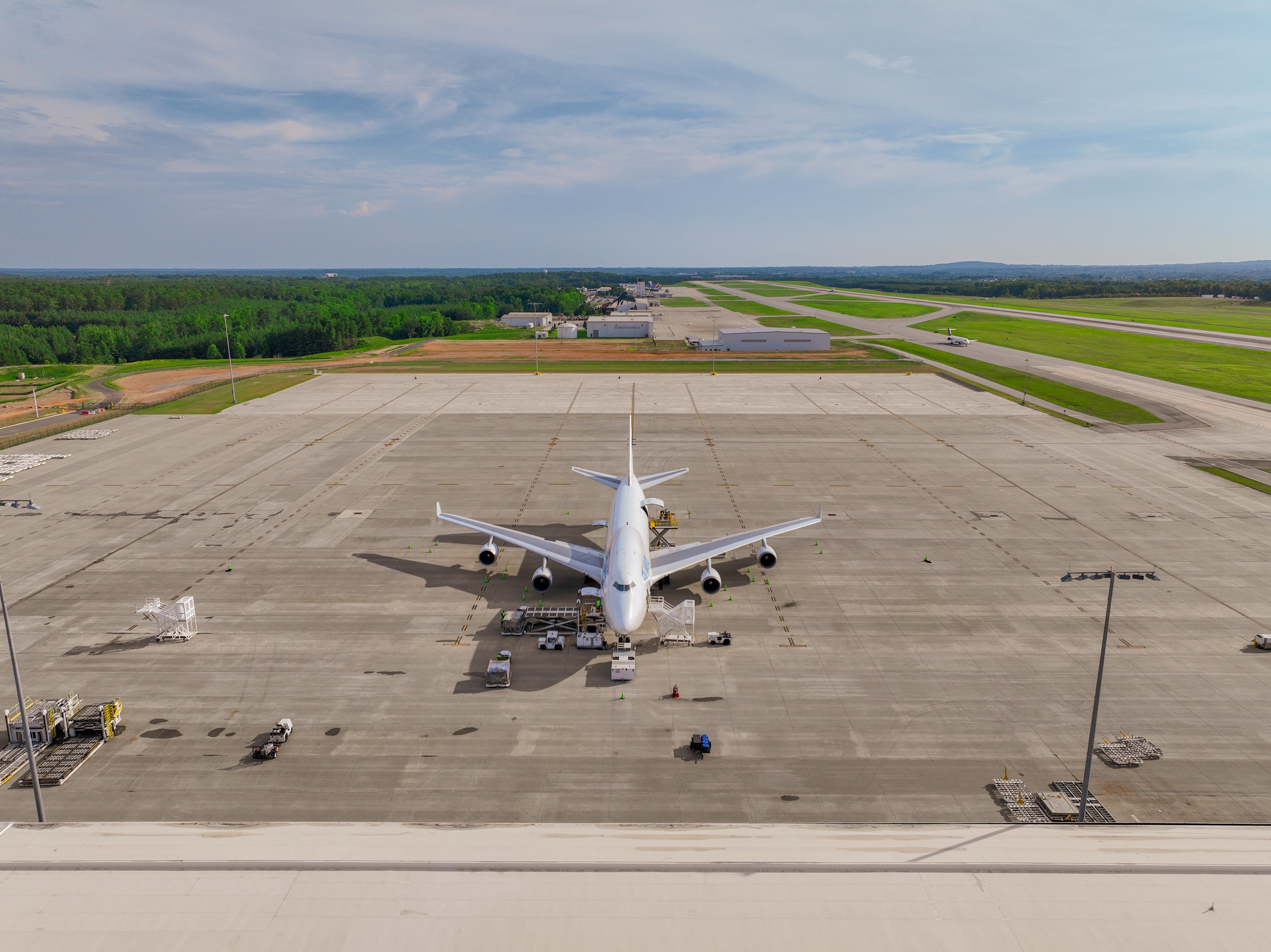 Drone shot of three wide body aircraft at the cargo facility.Drone shot of the newly expanded cargo apron.