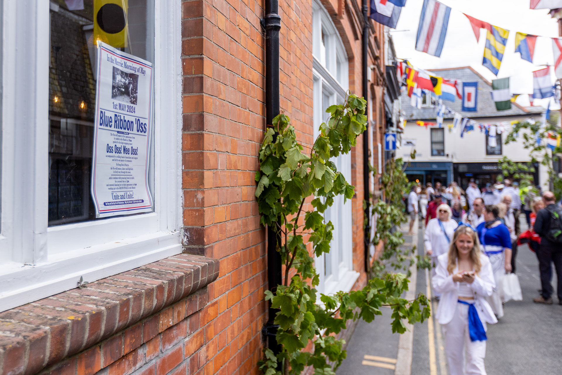 Crowds gather in the streets of Padstow for the annual May Day ‘Obby Oss’ celebrations. The tradition is seen to welcome the coming of summer and its origins are unknown, however the earliest mentions of its celebrations date back to 1803. © Luke Williams, 2024. All rights reserved.
