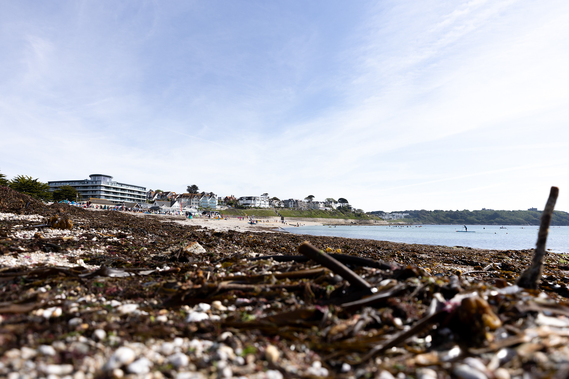 Locals take part in a Surfers Against Sewage 'paddle out' protest at Gyllyngvase Beach, Cornwall. Wanting to put an end to sewage pollution here in the UK, this was one of many paddle out protests that took place across the country. © Luke Williams, 2025. All rights reserved.