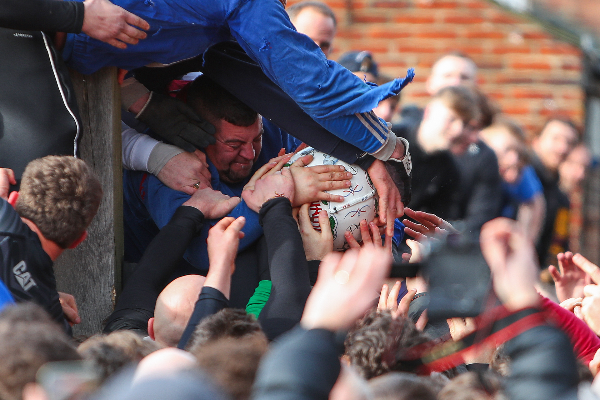 Tuesday 17th February 2026: Players wrestle for possession during the annual Royal Shrovetide Football match, a centuries-old tradition played across the town on Shrove Tuesday and Ash Wednesday. © Luke Williams, 2026. All rights reserved.