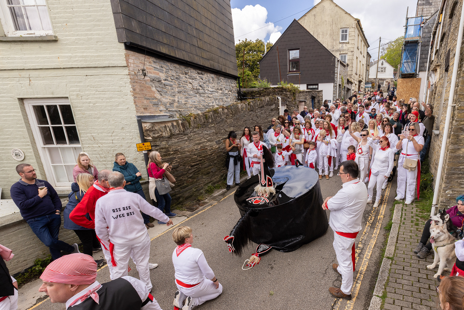 Crowds gather in the streets of Padstow for the annual May Day ‘Obby Oss’ celebrations. The tradition is seen to welcome the coming of summer and its origins are unknown, however the earliest mentions of its celebrations date back to 1803. © Luke Williams, 2024. All rights reserved.