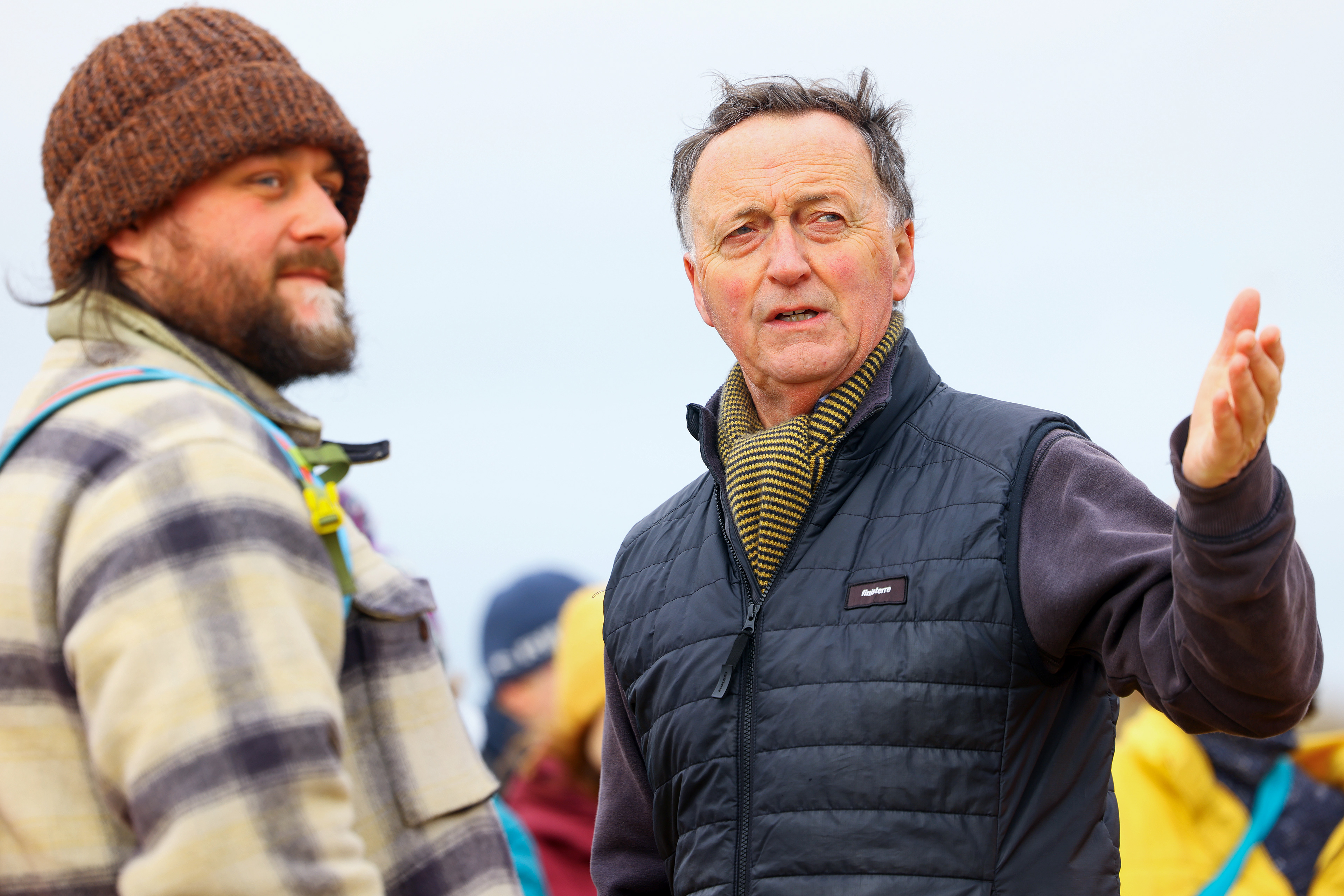 Demonstrators gather during an SOS Cornwall protest that is trying to prevent the selling off of sand from Hayle Beach in Cornwall, England. There has been outrage and concerns recently that sand is being 'stolen' from the beach. Hayle Towans Beach was voted the United Kingdom’s best beach in 2024. Shot for Stella Pictures LTD