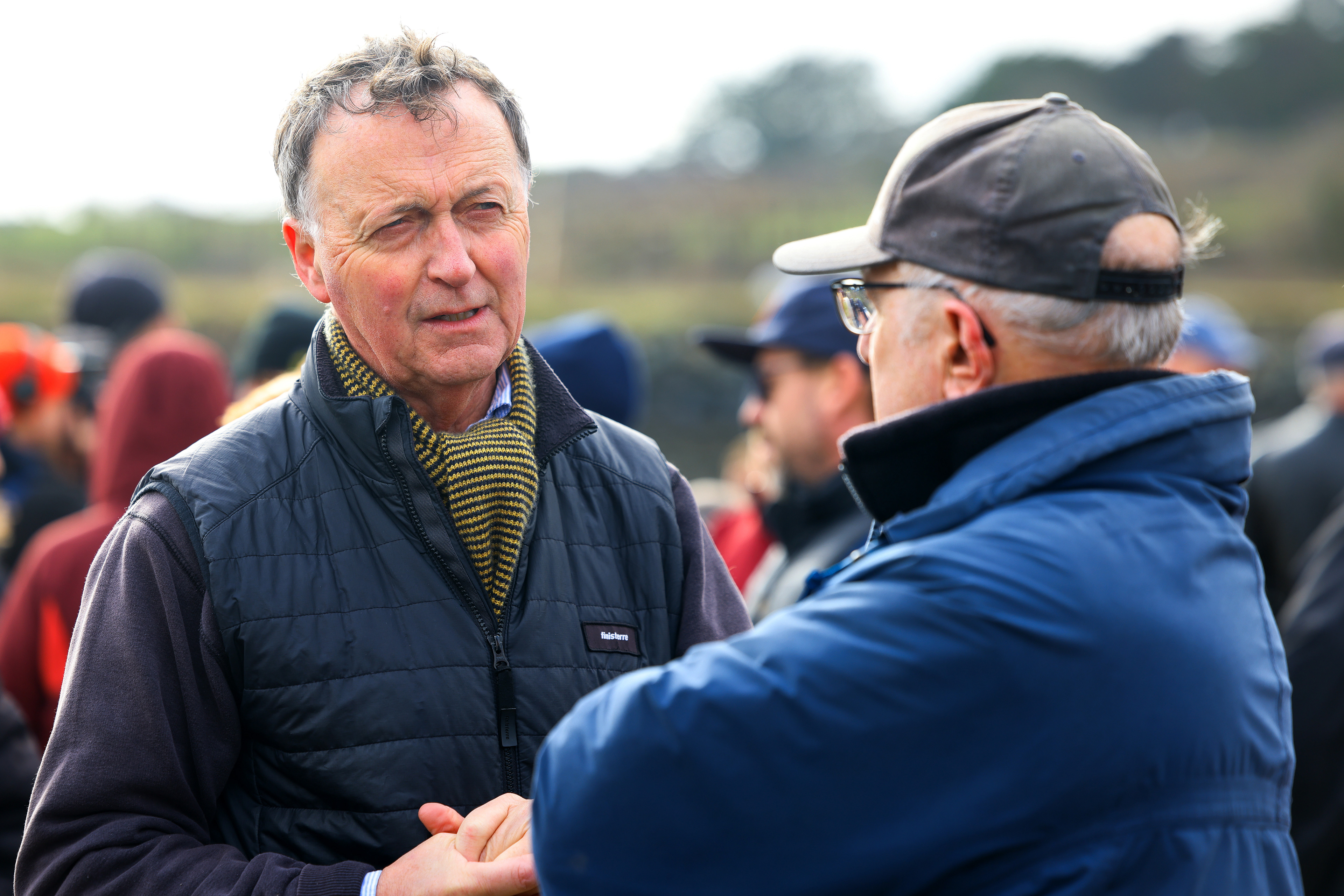 Demonstrators gather during an SOS Cornwall protest that is trying to prevent the selling off of sand from Hayle Beach in Cornwall, England. There has been outrage and concerns recently that sand is being 'stolen' from the beach. Hayle Towans Beach was voted the United Kingdom’s best beach in 2024. Shot for Stella Pictures LTD