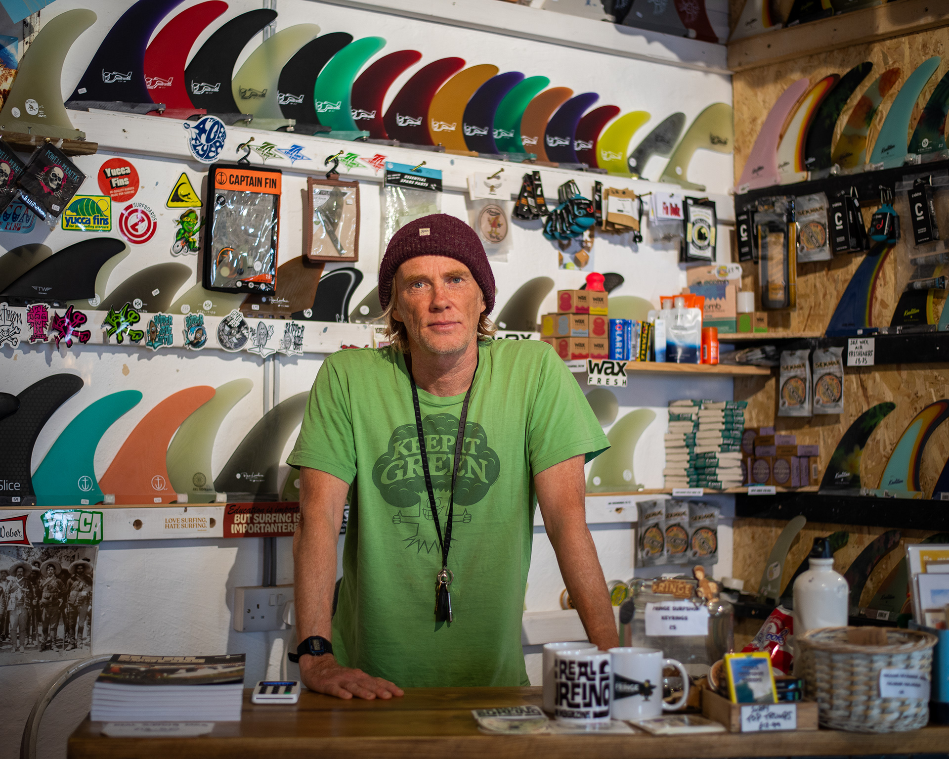 A series of environmental portraits taken for Steve Halpin and his alternative surfshop, "The Temple of Fringe" located on Bank St in Newquay, Cornwall. Steve, aka Stevo is a well-known and loved character in the Newquay community and writes an annual magazine named Real Surfing Magazine. © Luke Williams, 2023. All rights reserved.