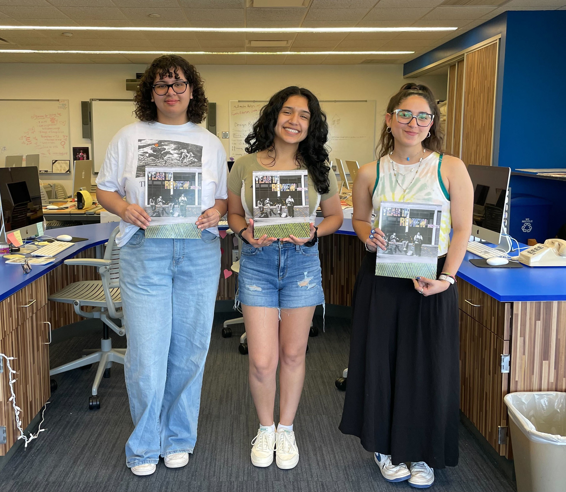 With head editor and design editor
