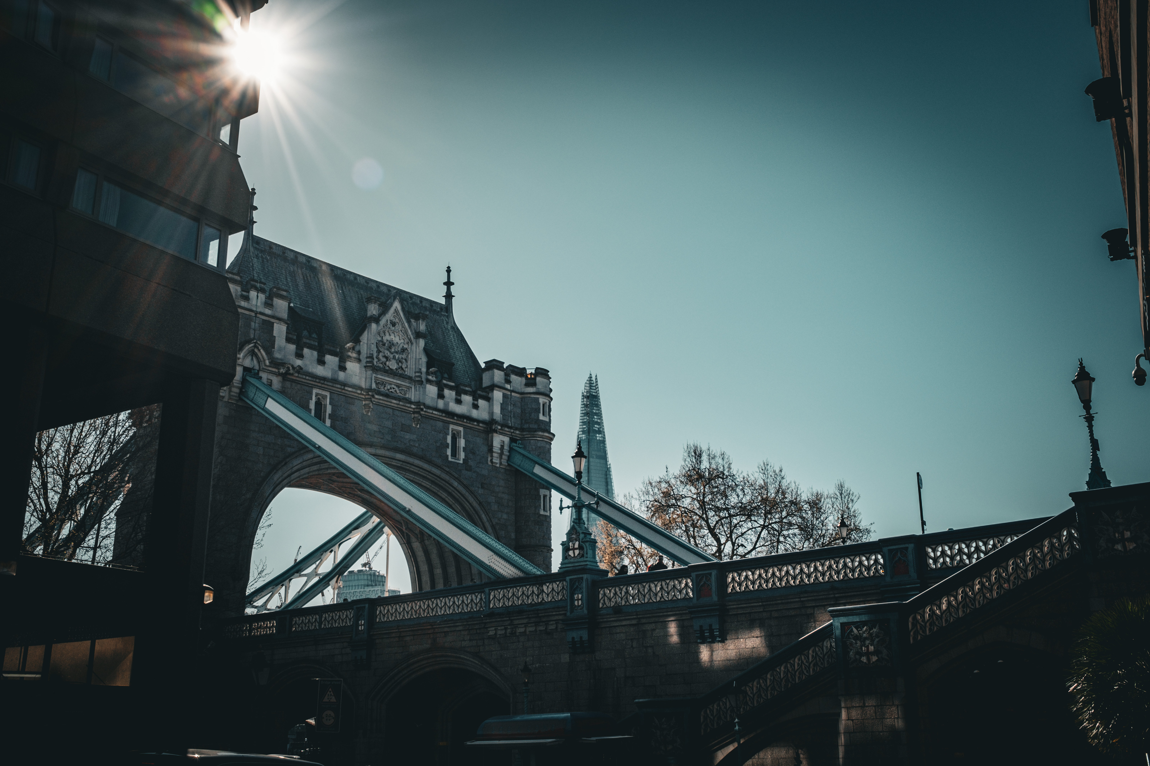 The sun peaking round Tower Bridge