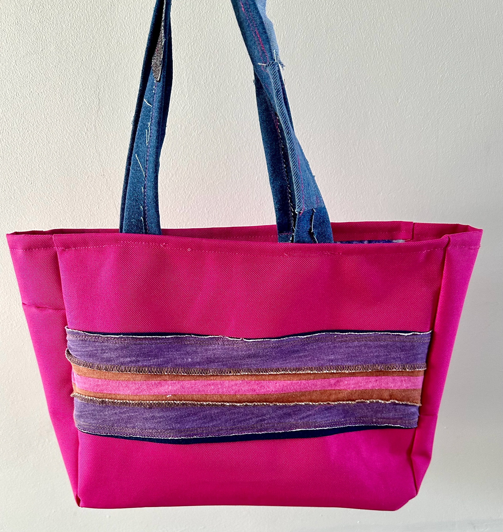 Pink tote bag with second hand embellishments