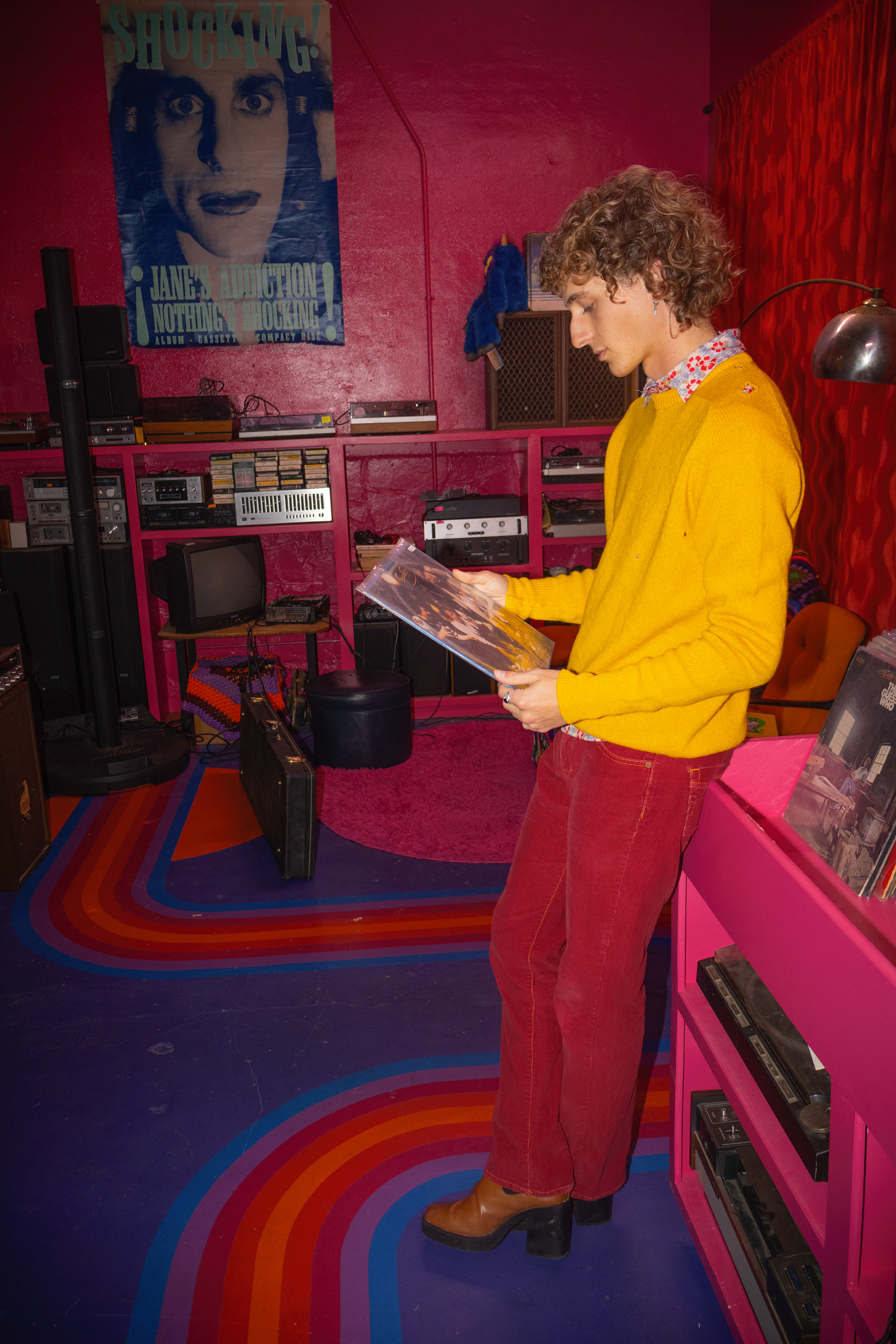 vintage wool sweater and red corduroy jeans