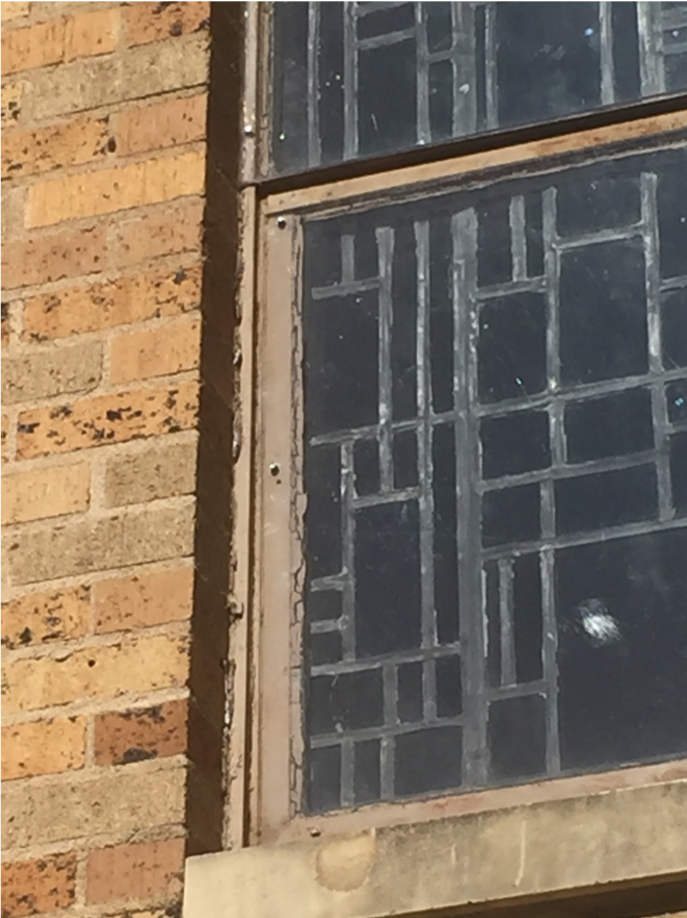 peeling paint and crumbling putty