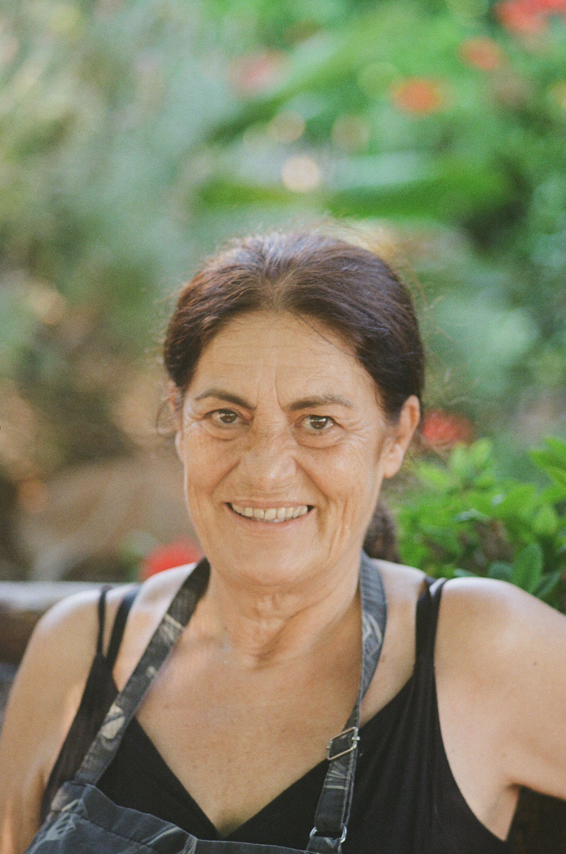 This is Agnus, she works 11hr shifts, at a restaurant in Profilia, Rhodes, everyday in the summer months. In the winter she goes into the fields to help out with picking olives. She barely has anytime off to relax but when she does she spends the time looking after her grandchildren teaching them to dance.