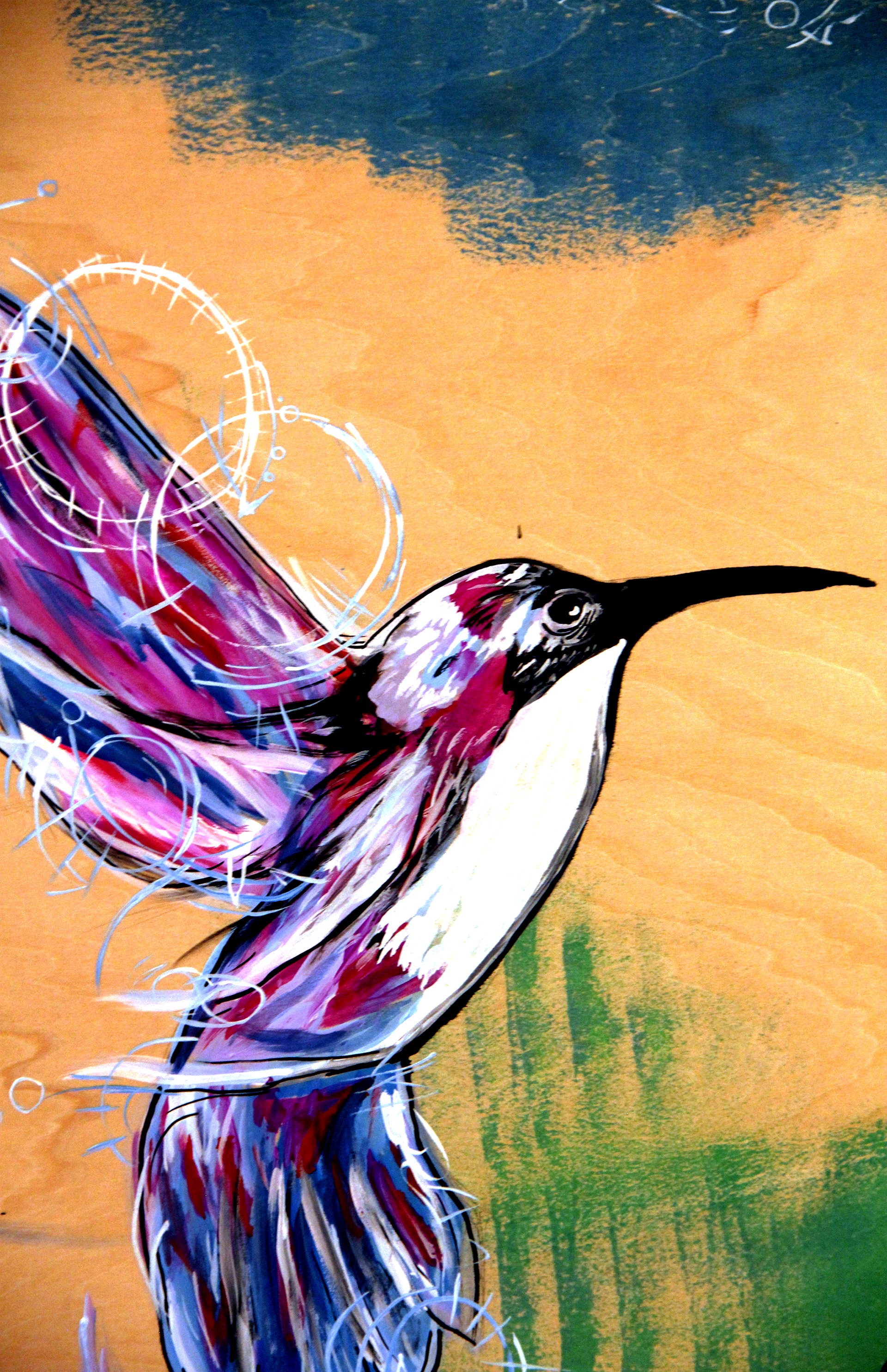 "Flutter" This humming bird was a part of the glimpse show as well. In the following picture you can see where it was on the wall. The majority of the wall was taken up by a character that would eventually be painted over. My daughters name means humming bird ans so now this piece lives in her room.
