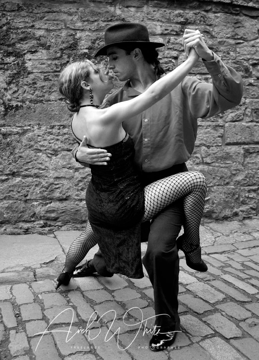 Tango, dancers, Argentinian Tango, dance, couple, passion, drama, dancing, Arch White Stock Photography.