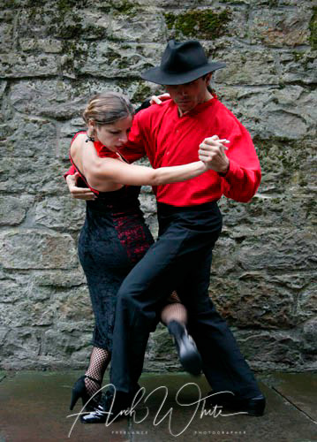 Tango, dancers, Argentinian Tango, dance, couple, passion, drama, dancing, Arch White Stock Photography.