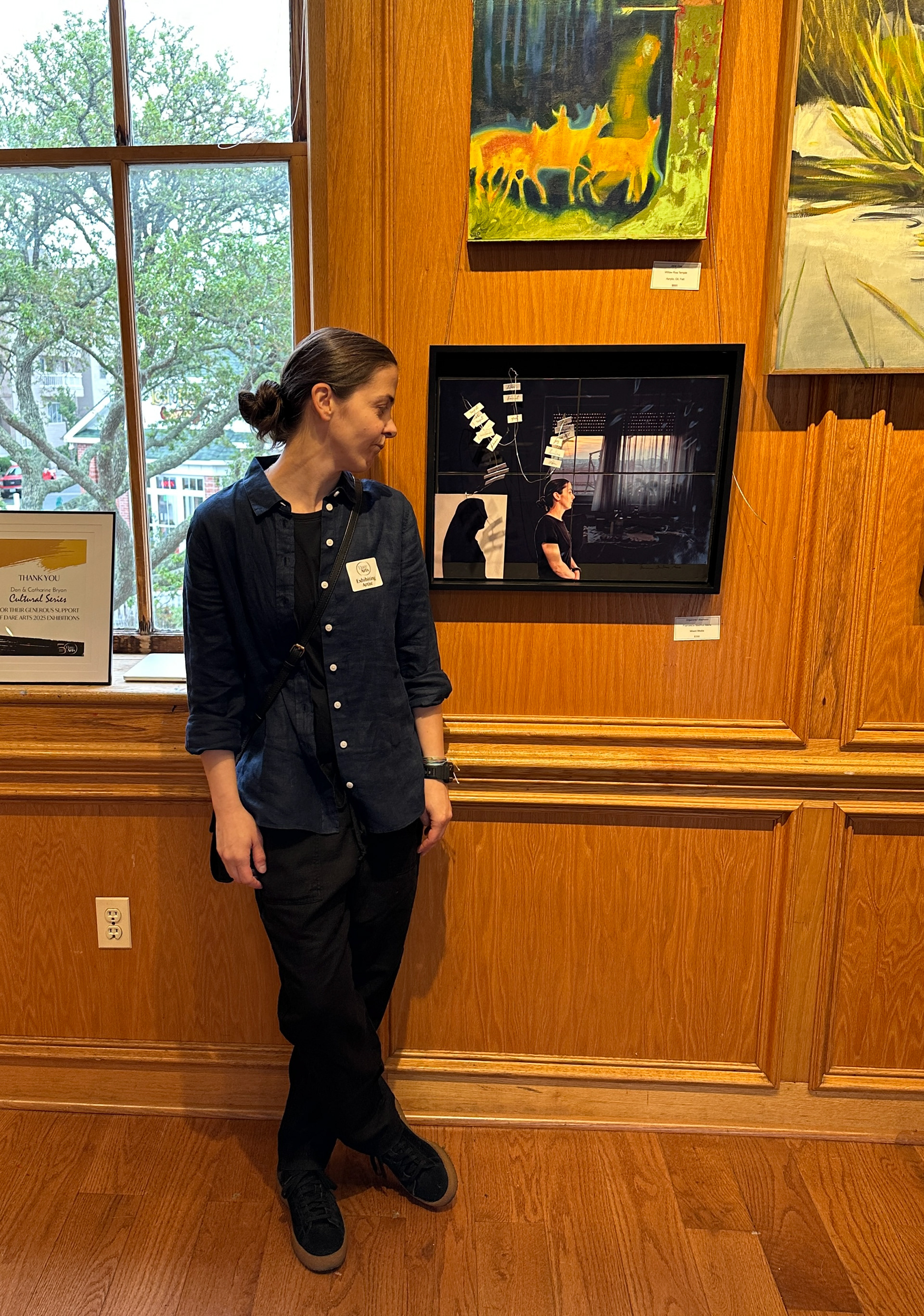 Posing next to Organized Madness at the opening of the 28th Annual Mollie Fearing Art Show 