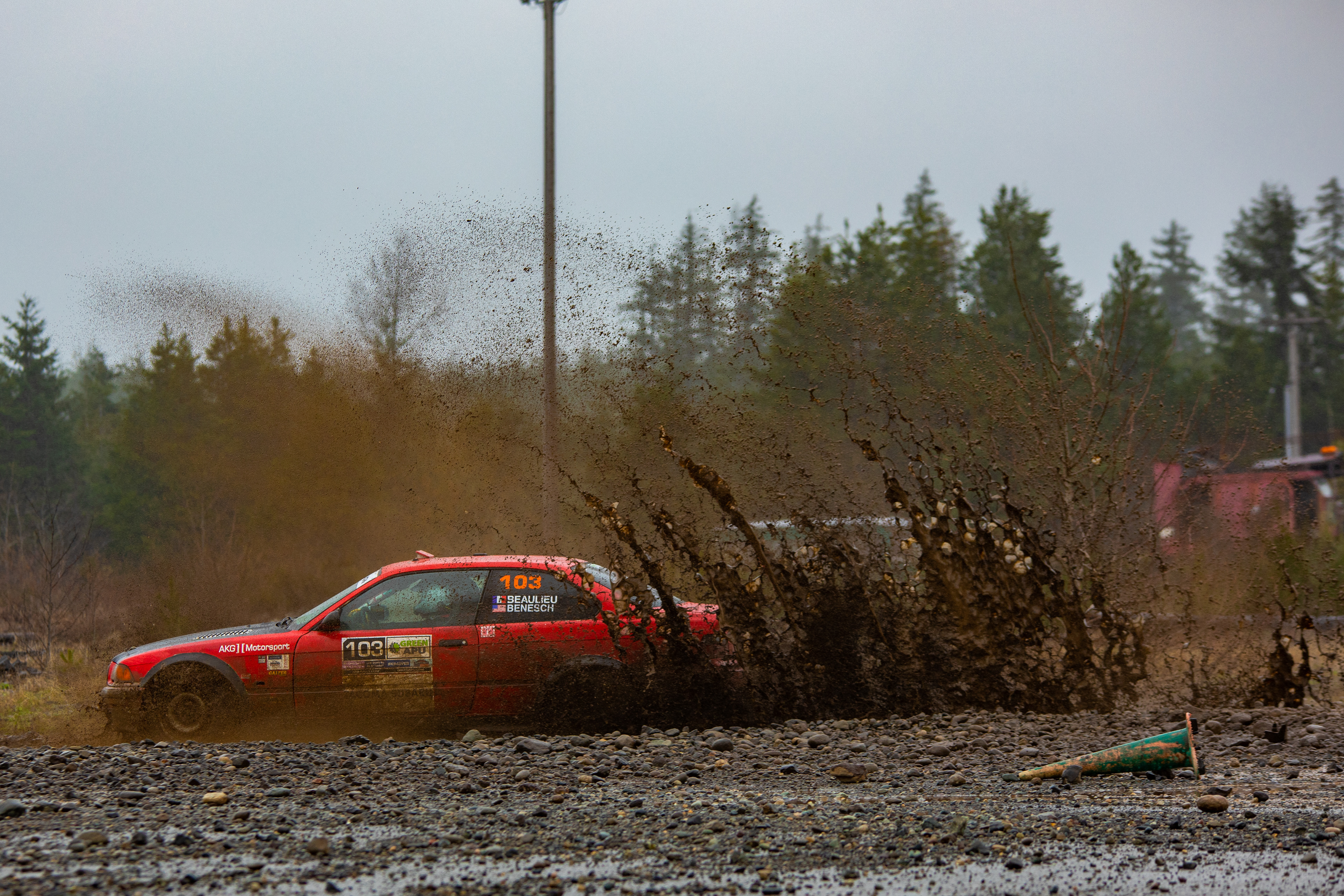 Romain Beaulieu and Noah Benesch soaking their '96 3 series in mud.