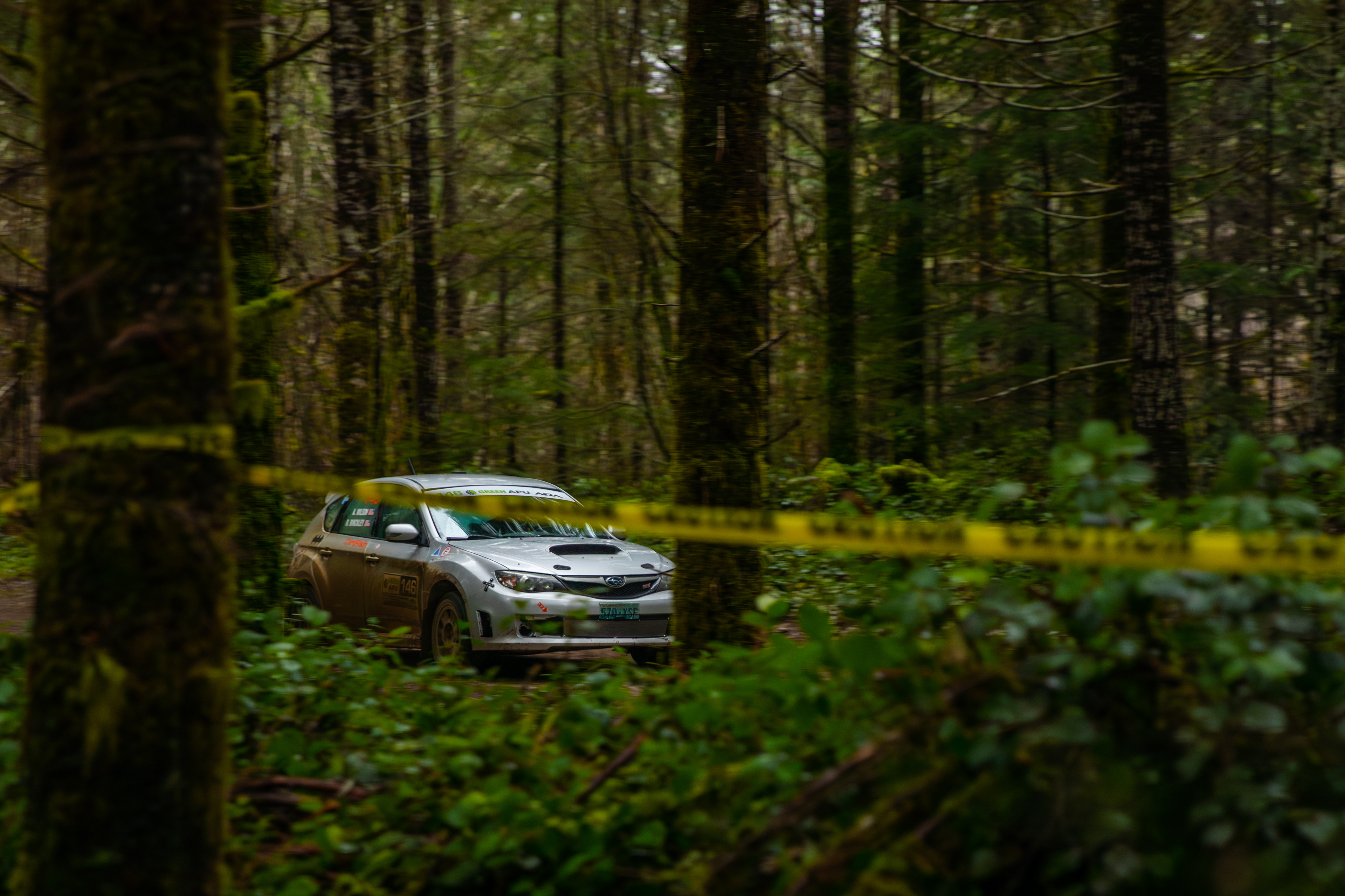 Ron Binckley and Aidan Wilson cutting through the woods at Stillwater.