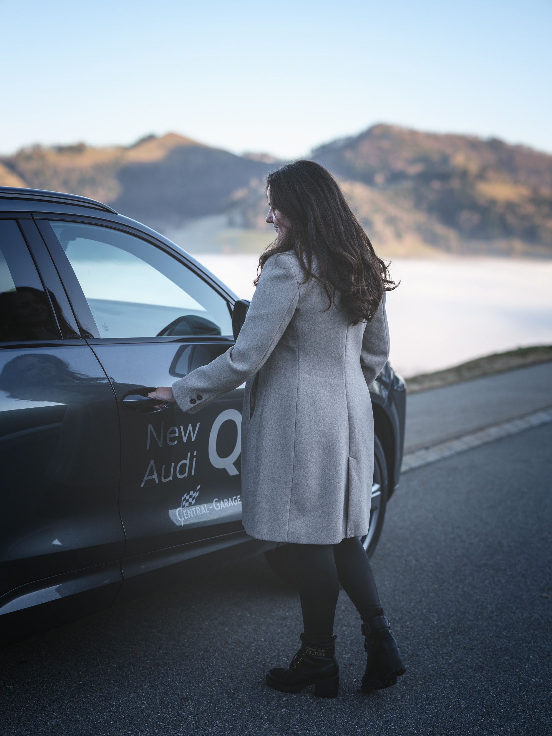 Audi Q3 Lifestyle Shot – Woman Opening Car Door in Nature