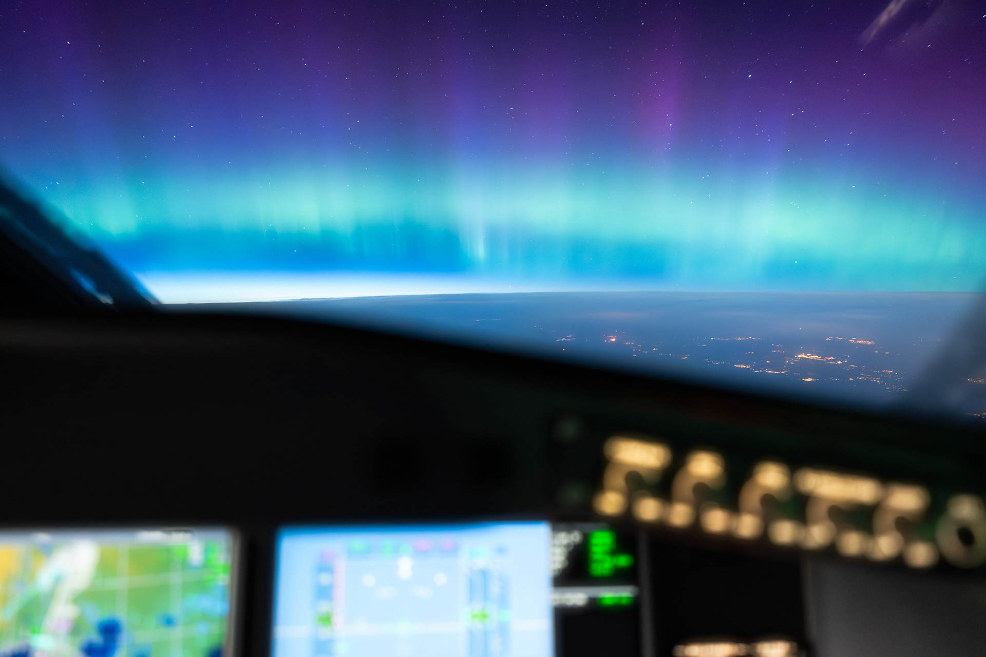 Cockpit View of Northern Lights