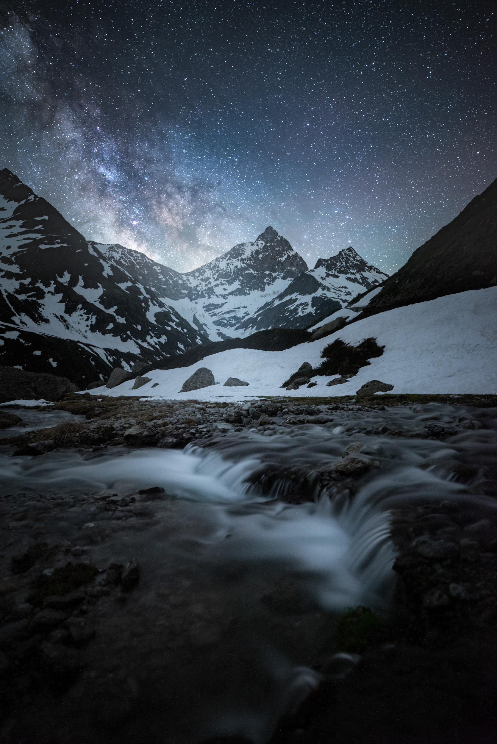 Snowy Peaks Beneath the Milky Way – Sustenbrüggli