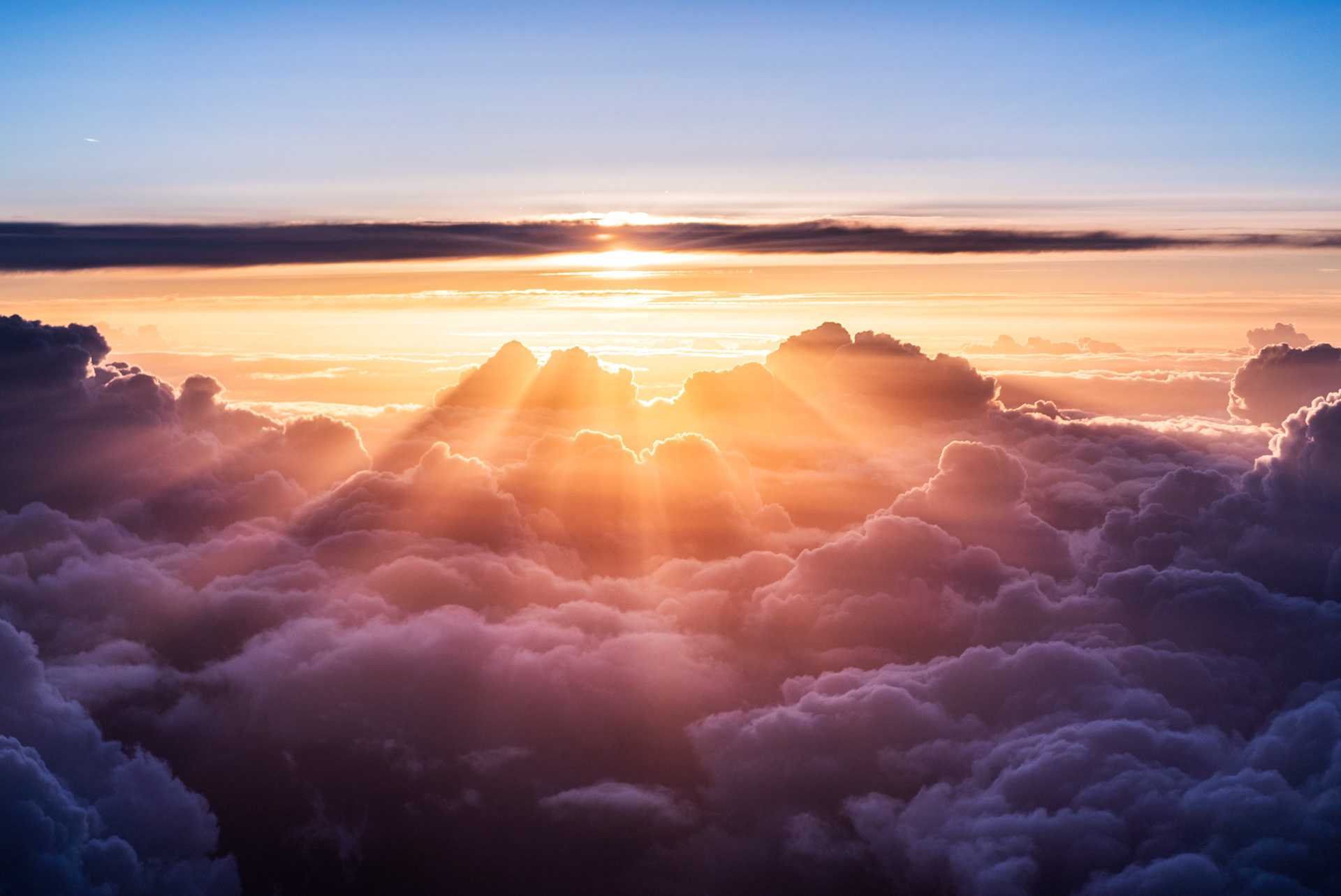 Sunrise Seen from Above the Clouds