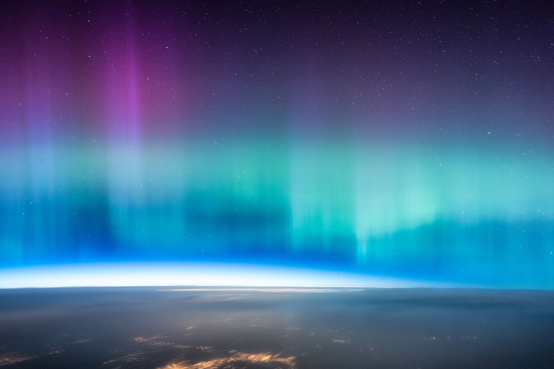 Vibrant Aurora Above Earth
