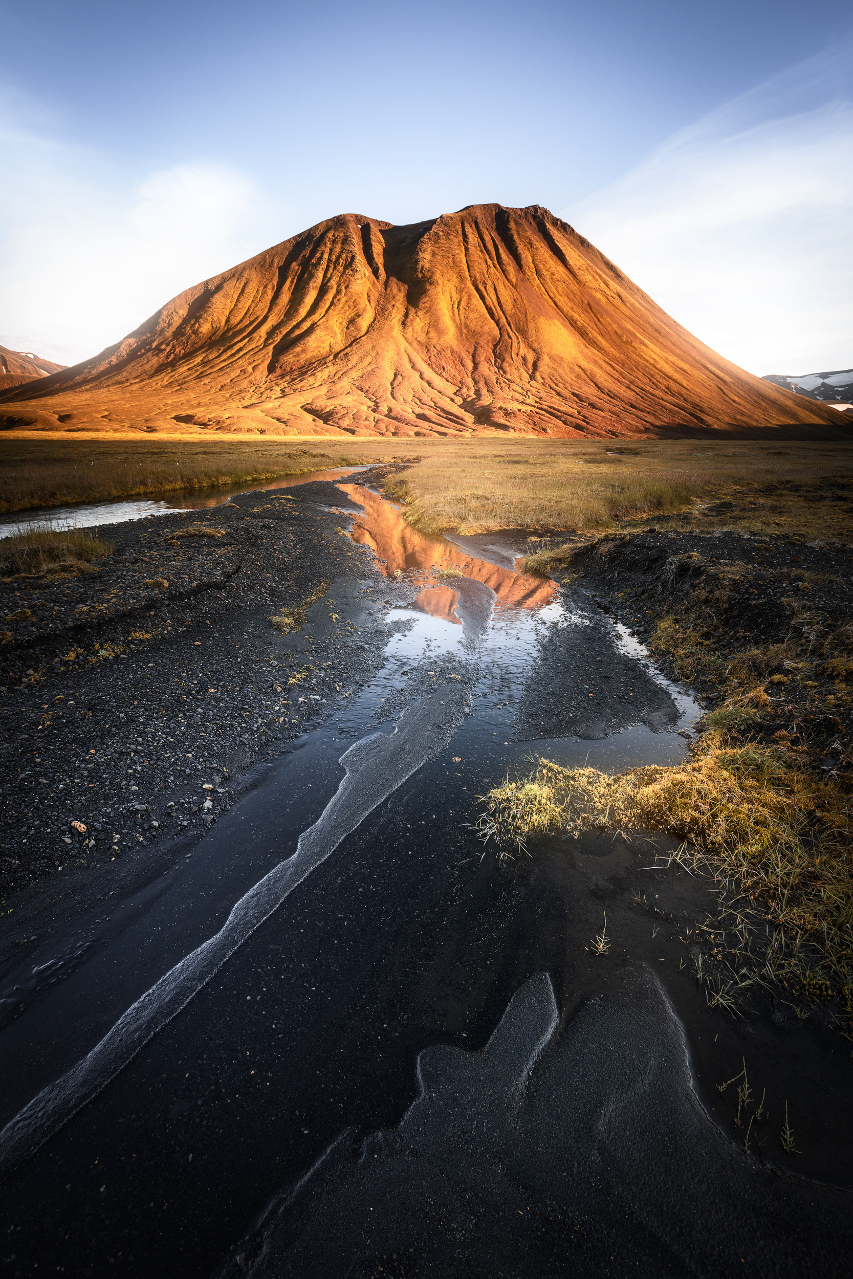 River Crossing in Iceland – Golden Light over Volcanic Mountains