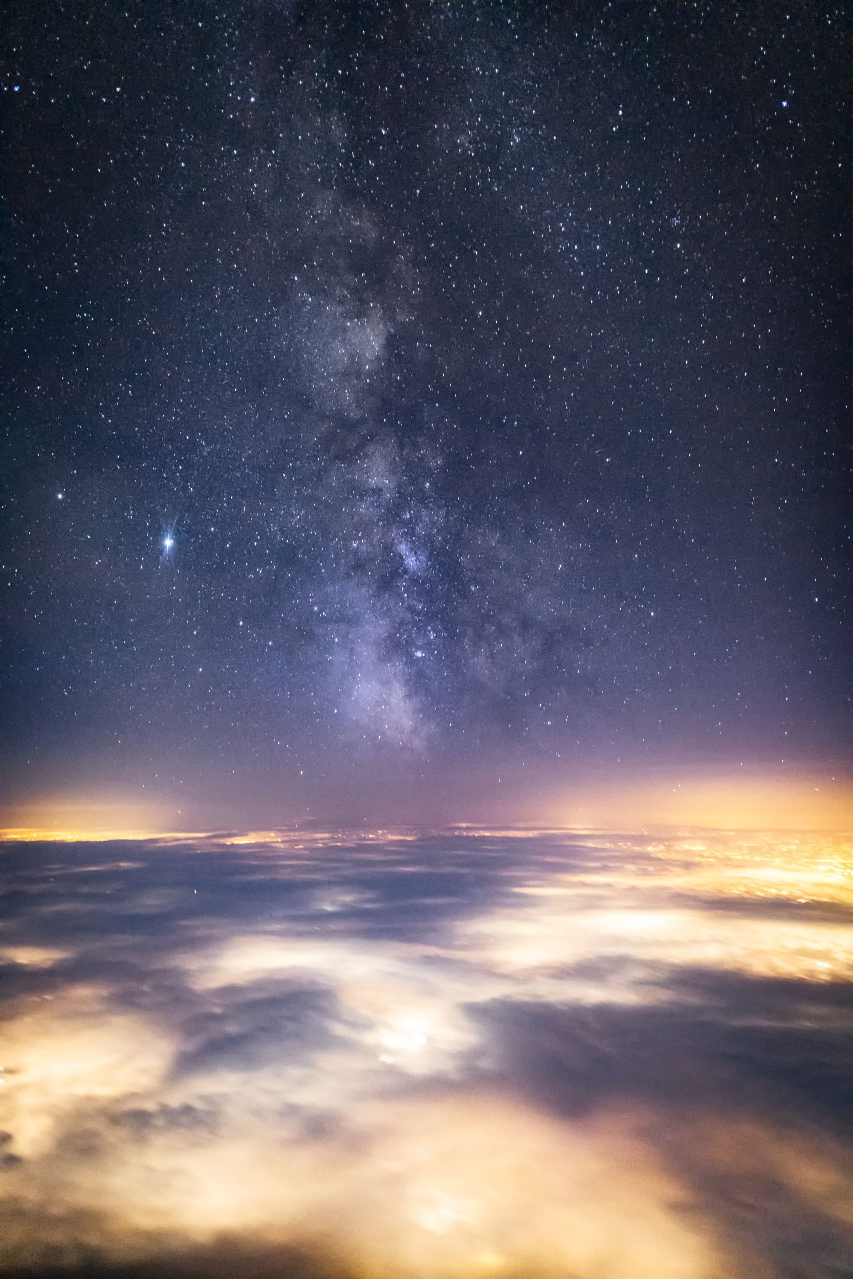 	Milky Way Above the Clouds