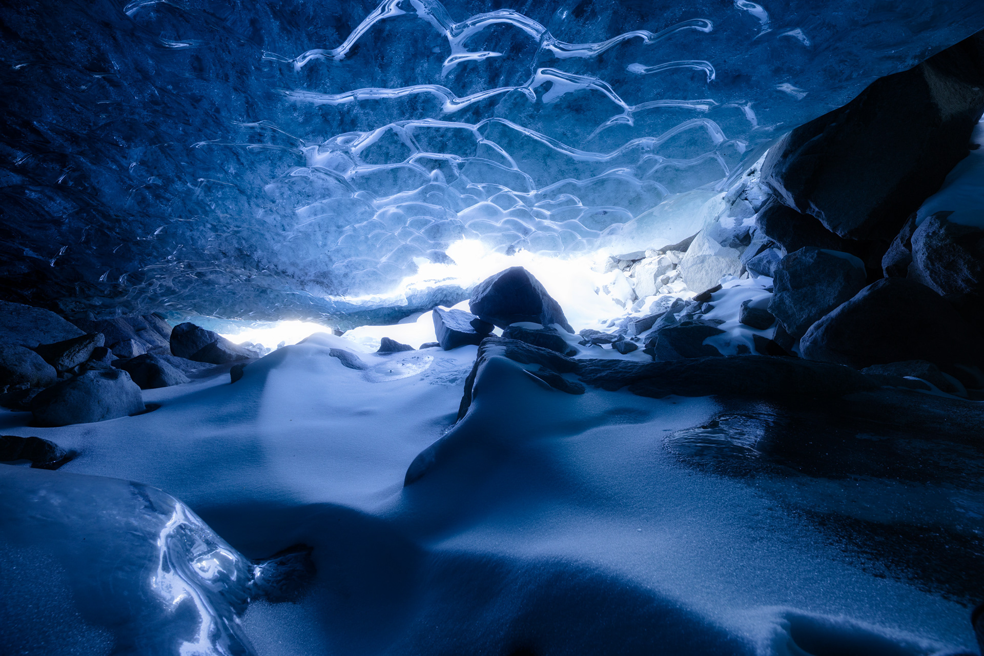 Exploring Swiss Ice Caves – Winter Snow Adventure Photography