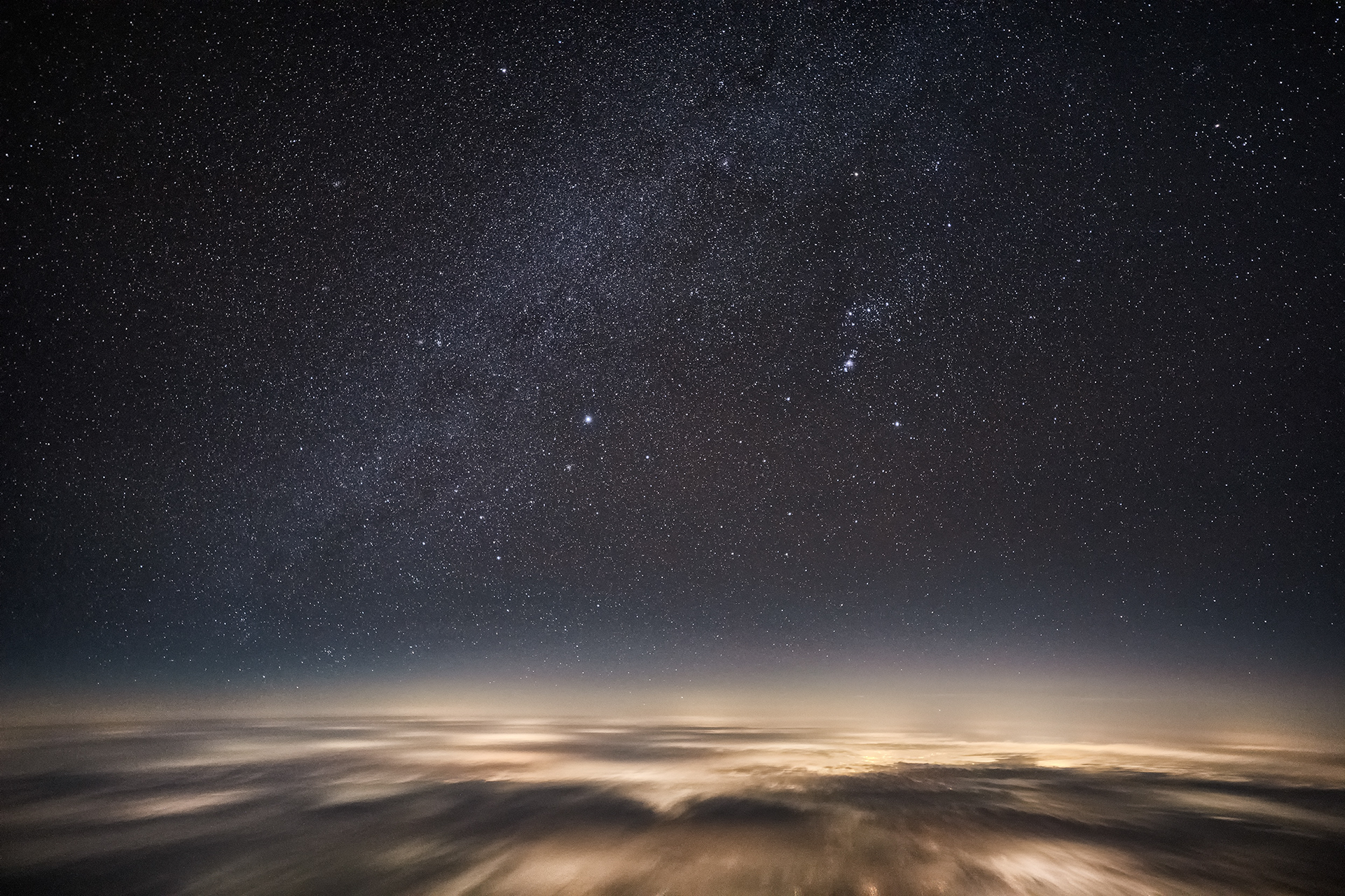 Winter Milky Way with Orion and Sirius from Above the Clouds