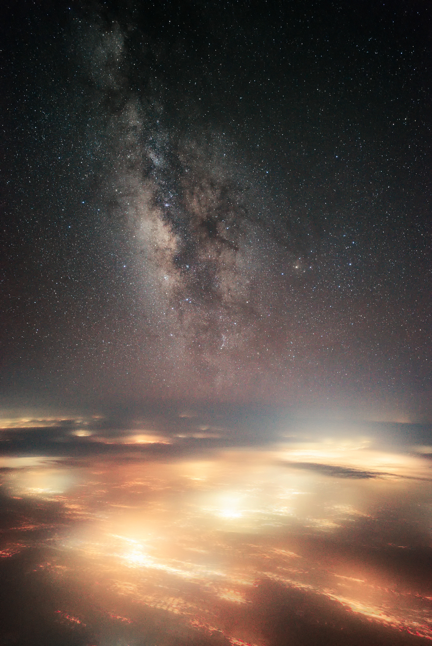 Stacked Milky Way Above the Clouds