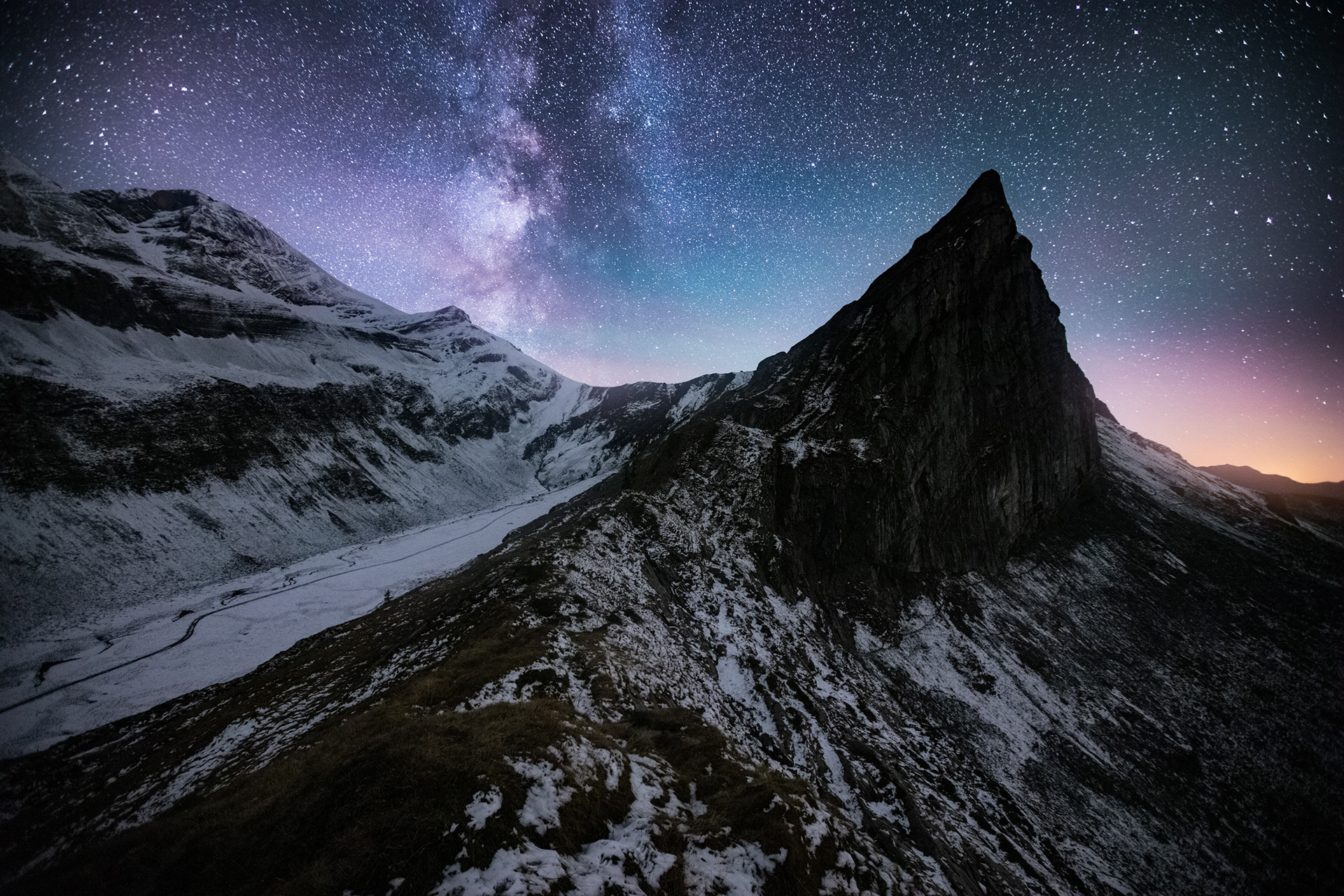 Milky Way Over Rugged Alpine Landscape