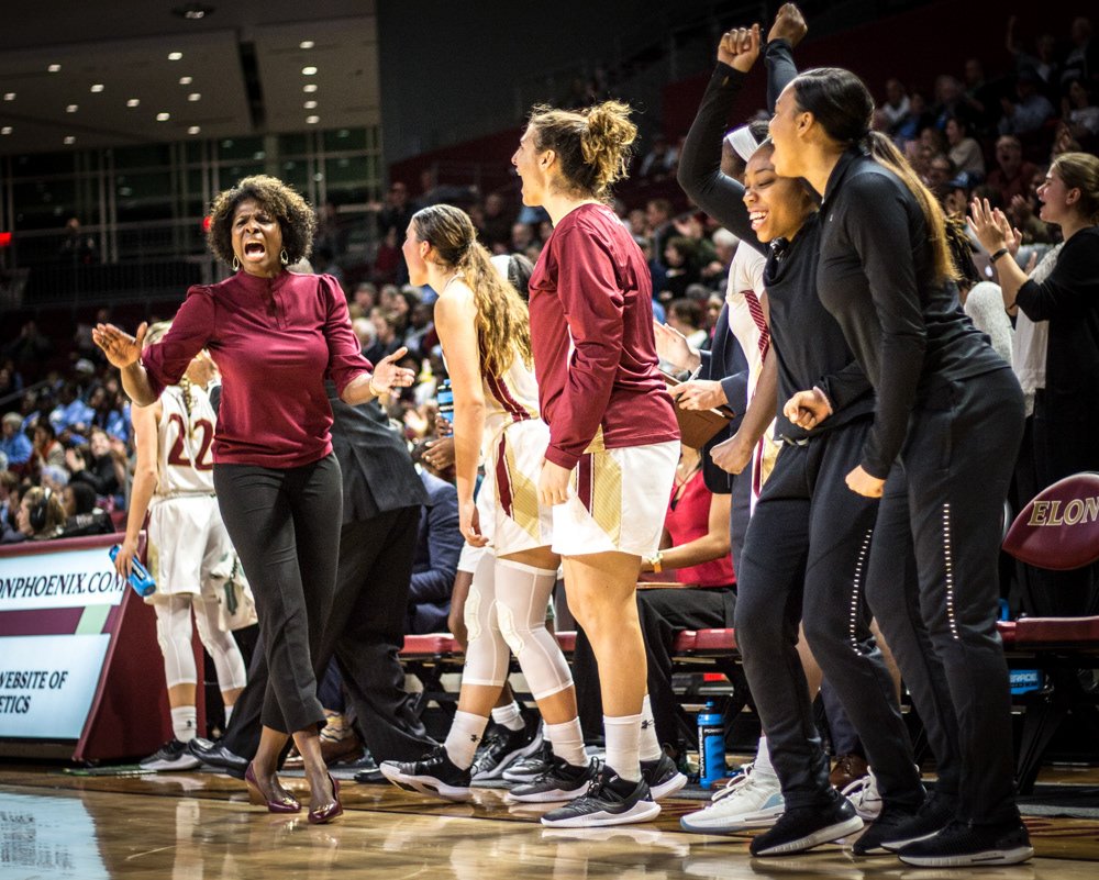 Coach Charlotte Smith celebrates a field goal against her alma mater at UNC-Chapel Hill.