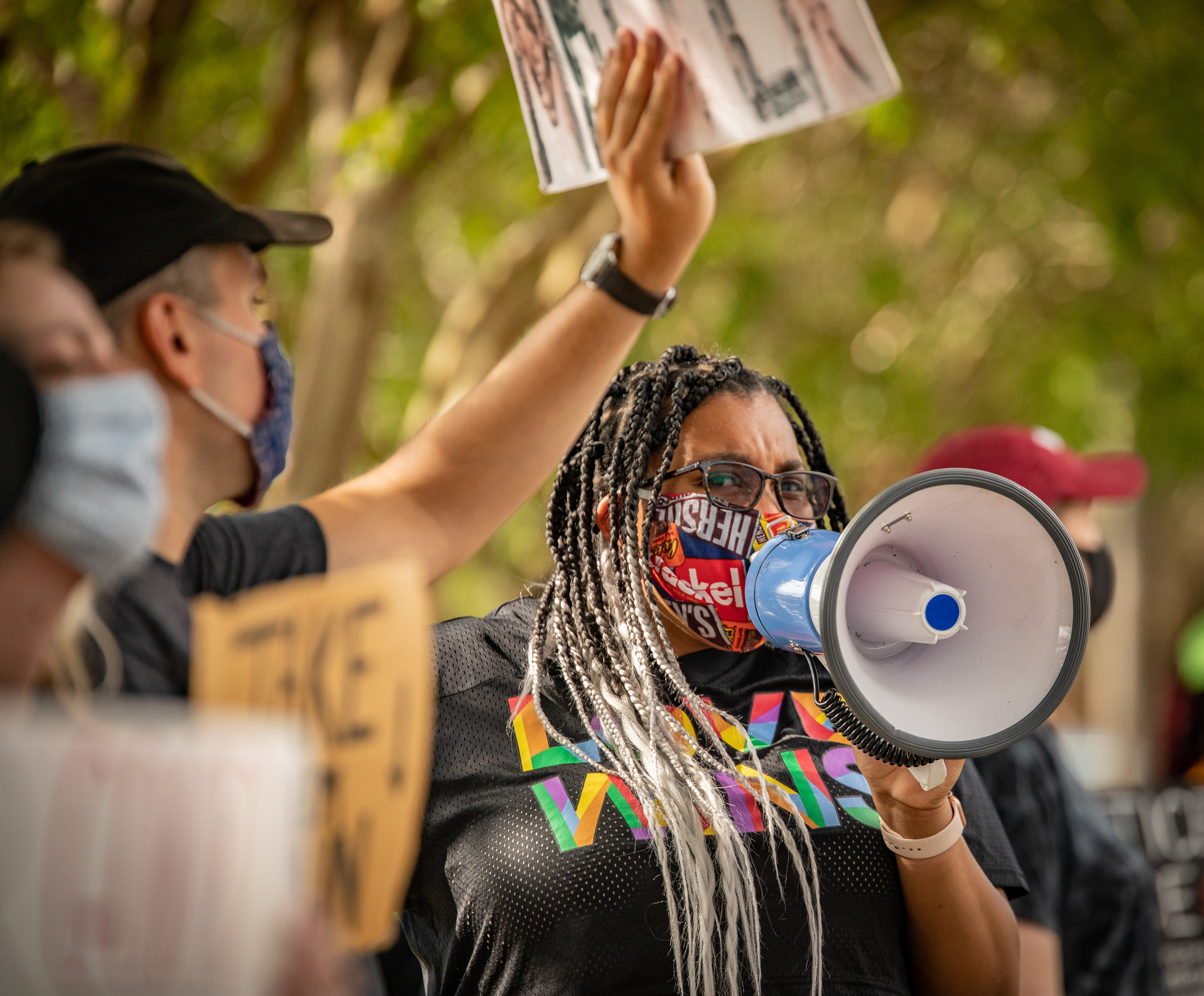 Elon sophomore Kennedy Boston chants "say their names" during Thursday's protest.