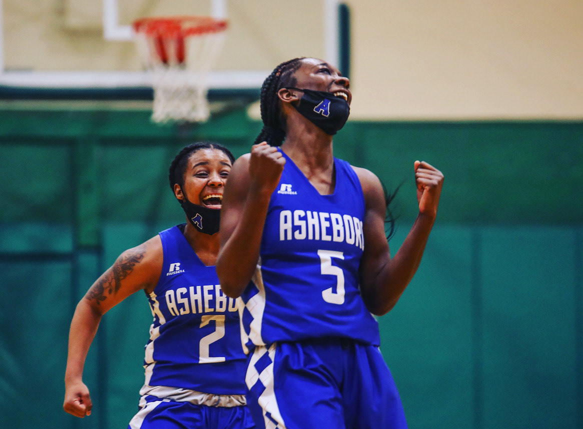 Asheboro celebrates after defeating Eastern Alamance High School in the NCHAA tournament.