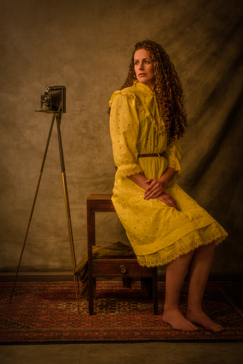 Sparked - A previous portrait of my sister Vera made during the basic course at the Fotovakschool, sparked my interest in portrait photography and made me decide to start the two-year education at the Fotovakschool. The pose of her and the position of the camera portrays her looking back to this and the fact that she doesn't necessarily want to be the model at that time.