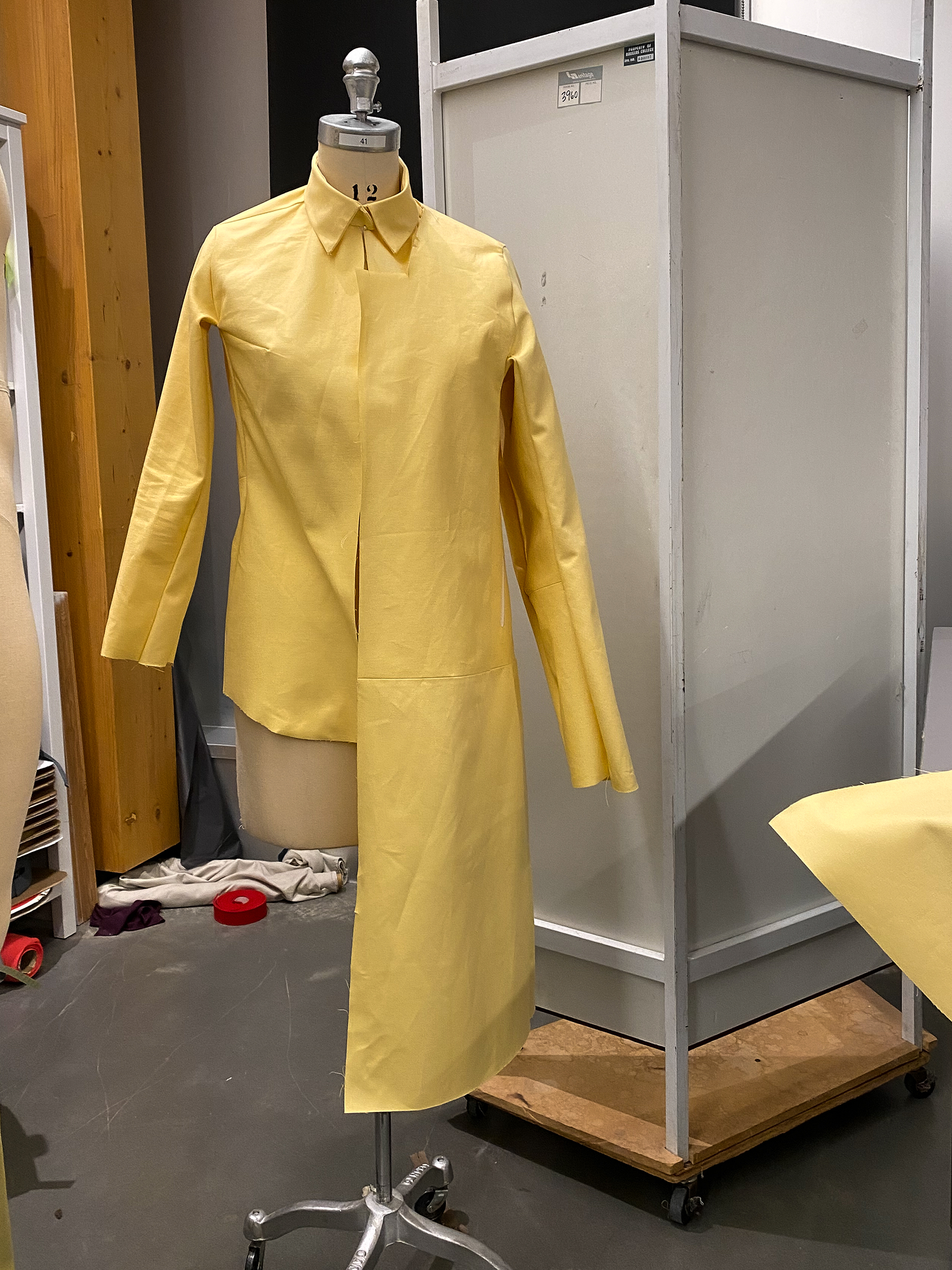 Comparing the lengths of the windbreaker block and shell jacket.