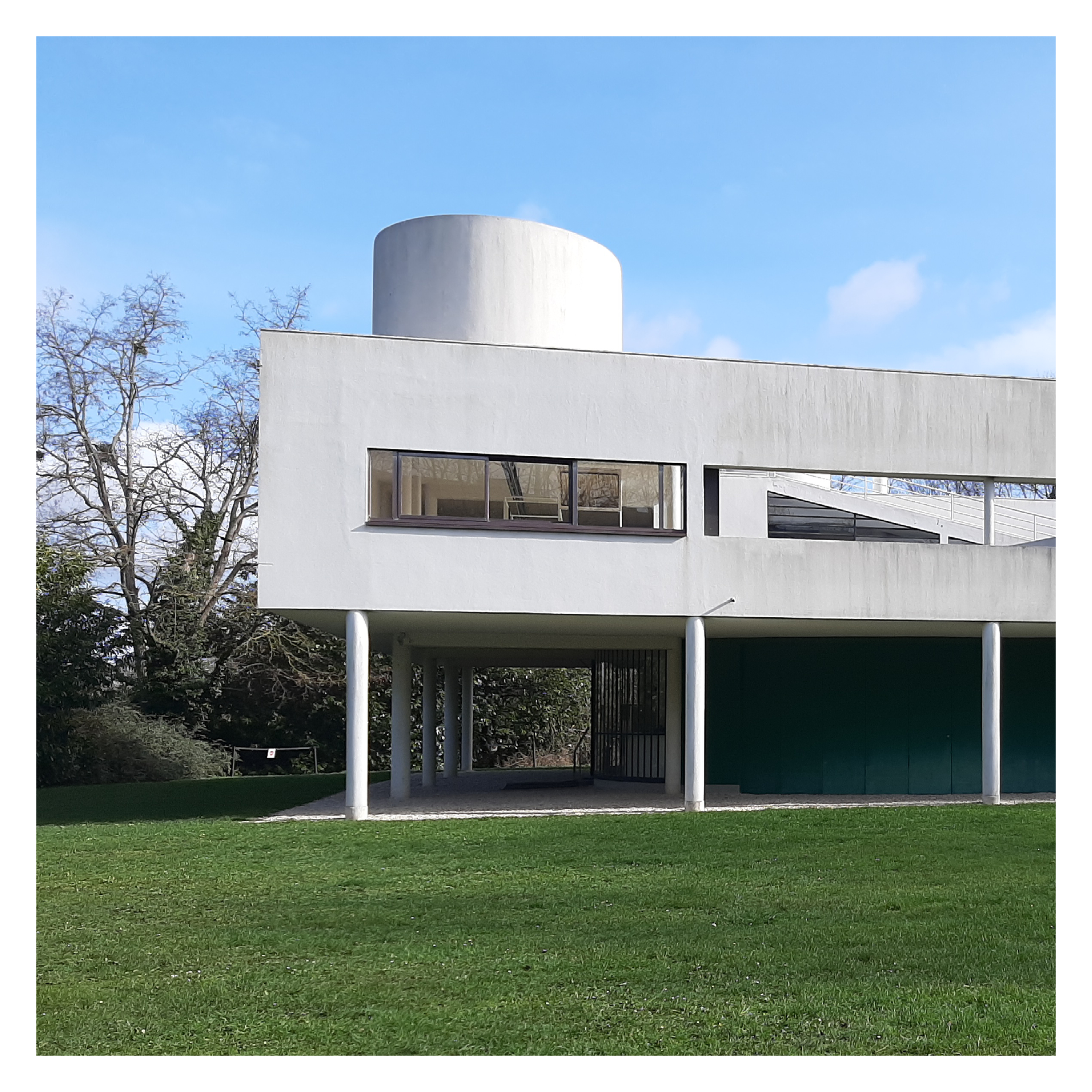 P20 | Villa Savoye | Le Corbusier's 'Five Points of Architecture' are prominently embodied in this pioneering design, completed in 1931. The use of structural columns instead of load-bearing walls allows for an open, flexible interior layout, exemplifying spatial fluidity. Long horizontal windows seamlessly integrate the structure with its surrounding landscape, enhancing the architectural intrigue through the contrast of rigid and fluid shapes and the play on scale.