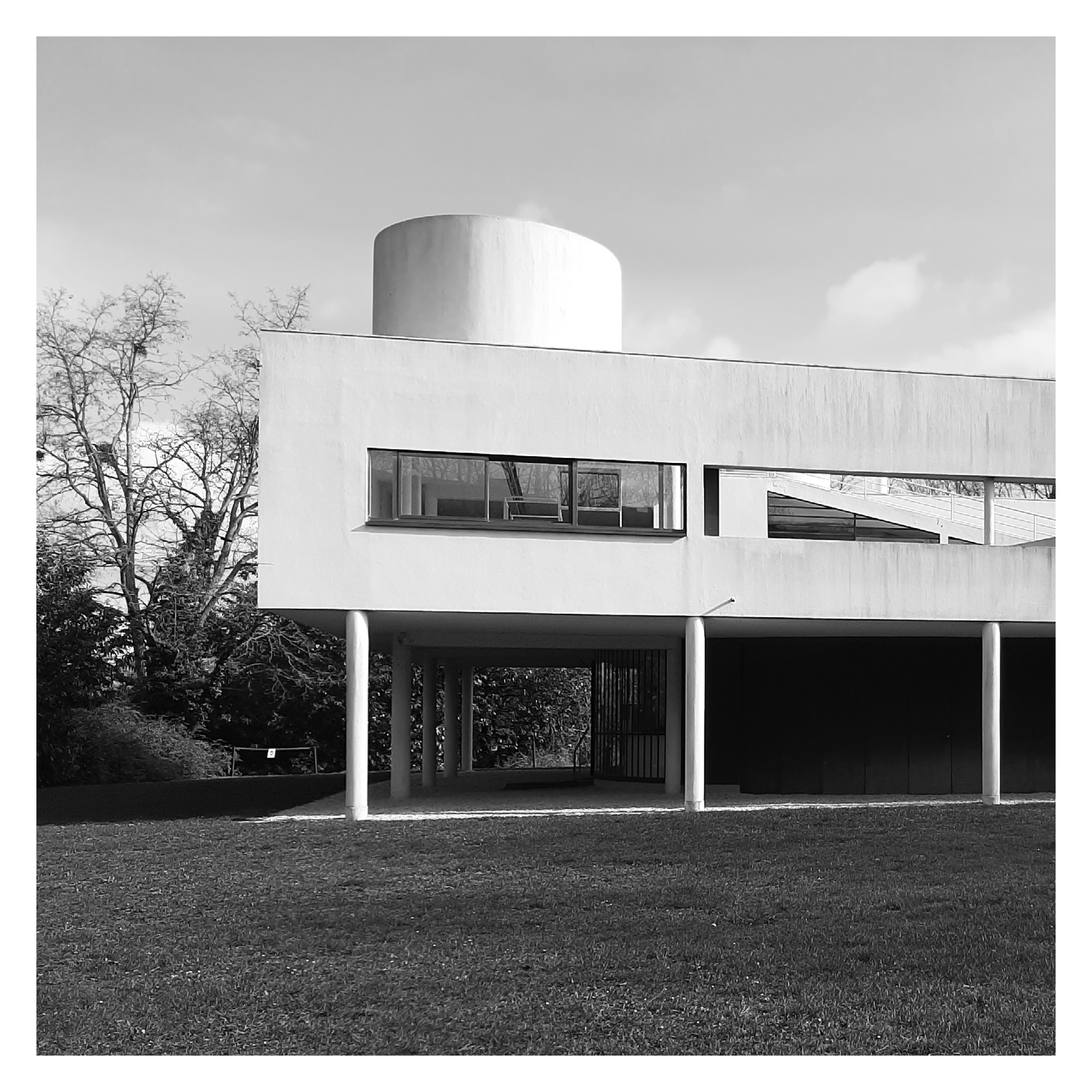 P20 | Villa Savoye | Le Corbusier's 'Five Points of Architecture' are prominently embodied in this pioneering design, completed in 1931. The use of structural columns instead of load-bearing walls allows for an open, flexible interior layout, exemplifying spatial fluidity. Long horizontal windows seamlessly integrate the structure with its surrounding landscape, enhancing the architectural intrigue through the contrast of rigid and fluid shapes and the play on scale.