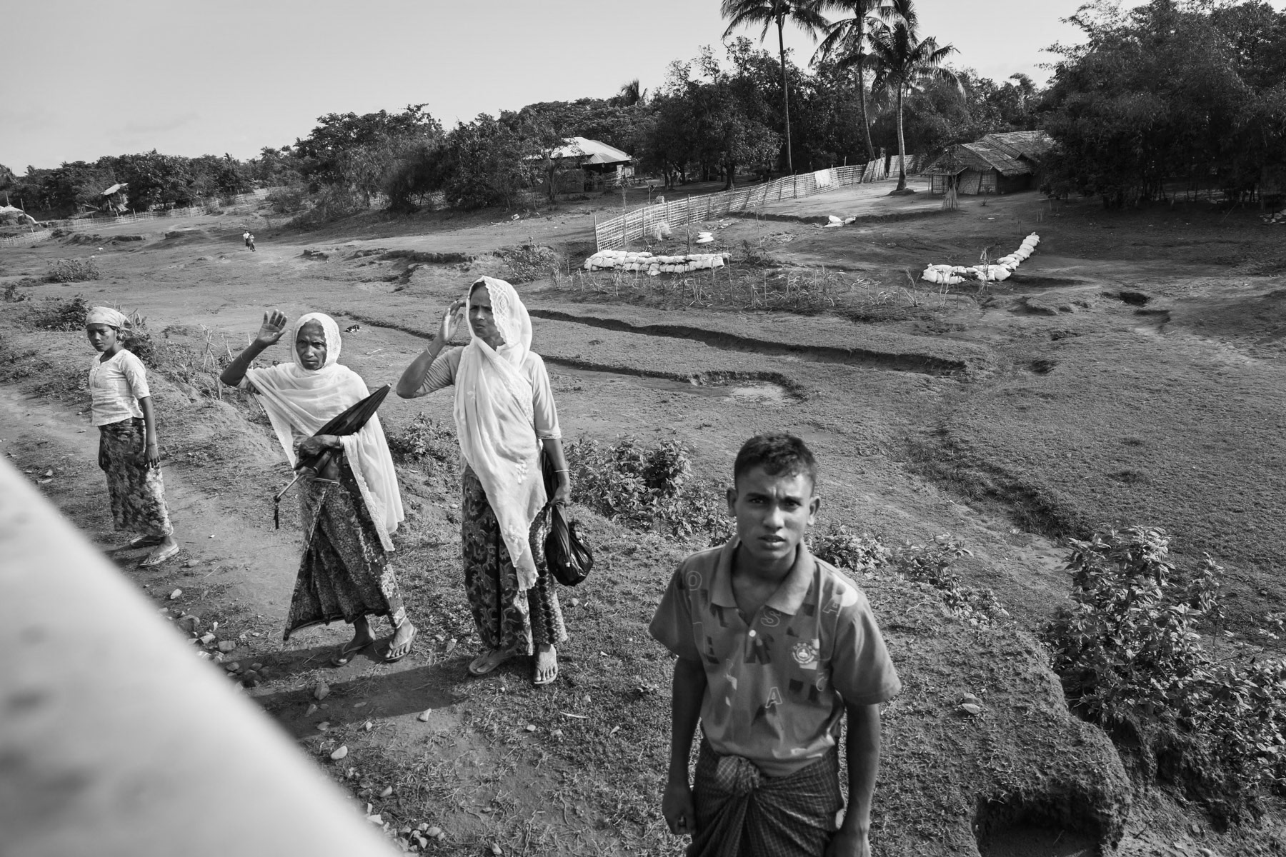 Rohingya IDPs waiting for the train to move in between IDP camps and Rohingya villages. Sittwe township, Rakhine, Myanmar, June 2016