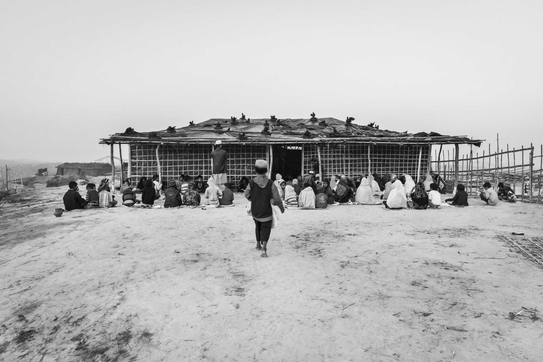 Improvised medressa or coranic school for Rohingya children that arrived from Myanmar during the past weeks. Having no access to formal education, un-registered Rohingya refugees have only the coranic schools as a sole form of education. New part of Kutupalong refugee camp for newly arrived refugees from Myanmar. Cox's Bazar, February 2017