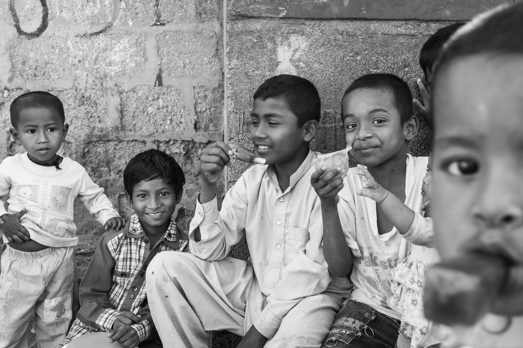 Ice cream time, Rohingya area of Arkanabad, Karachi, Pakistan, March 2018