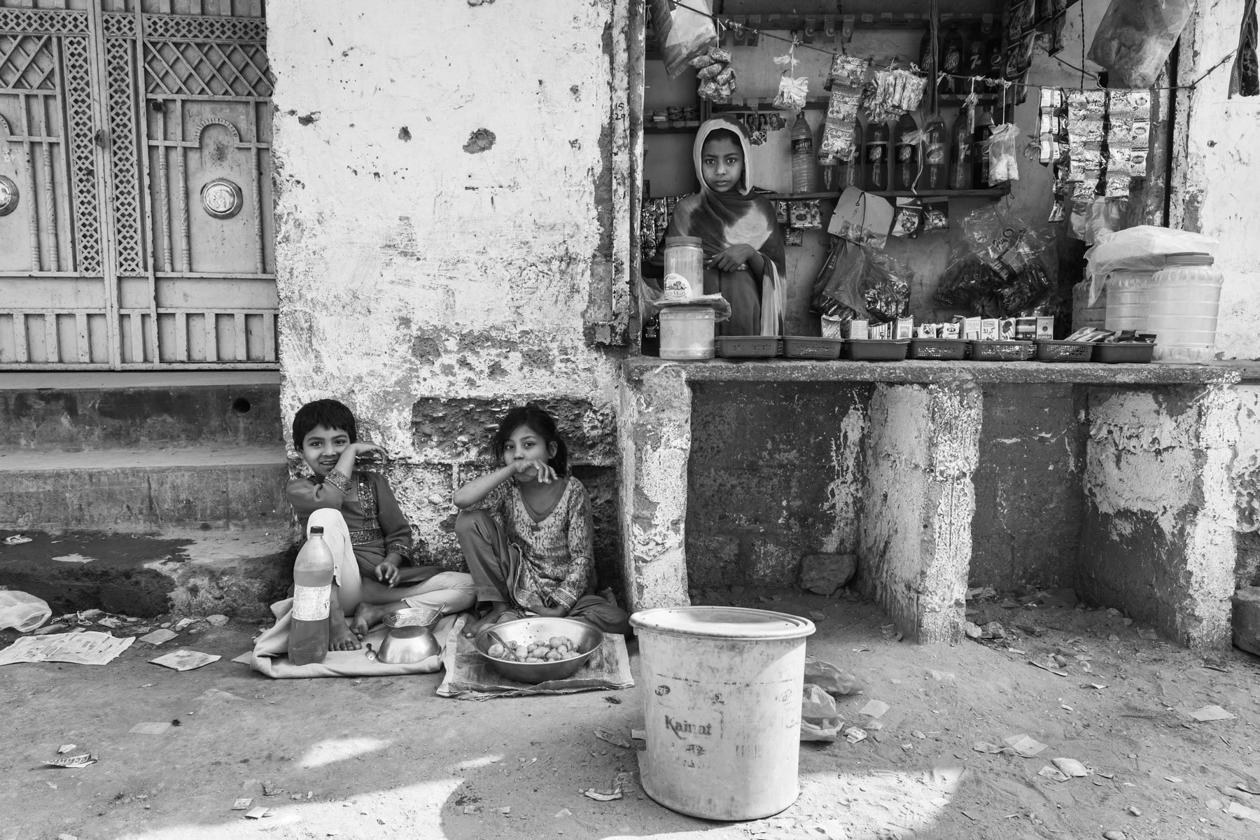 Children from the Rohingya comminity selling food. Hundred Quarters in Korangi part of greater Karachi, Pakistan, December 2016