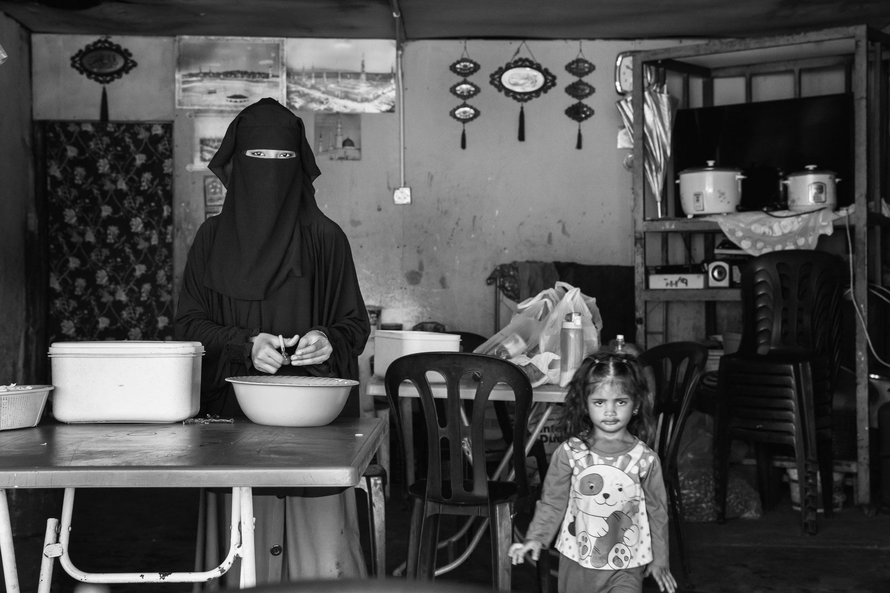 Food stall along a junction road, owned by a Rohingya family preparing speciality dishes from back home. Kuantan, Malaysia, June 2017
