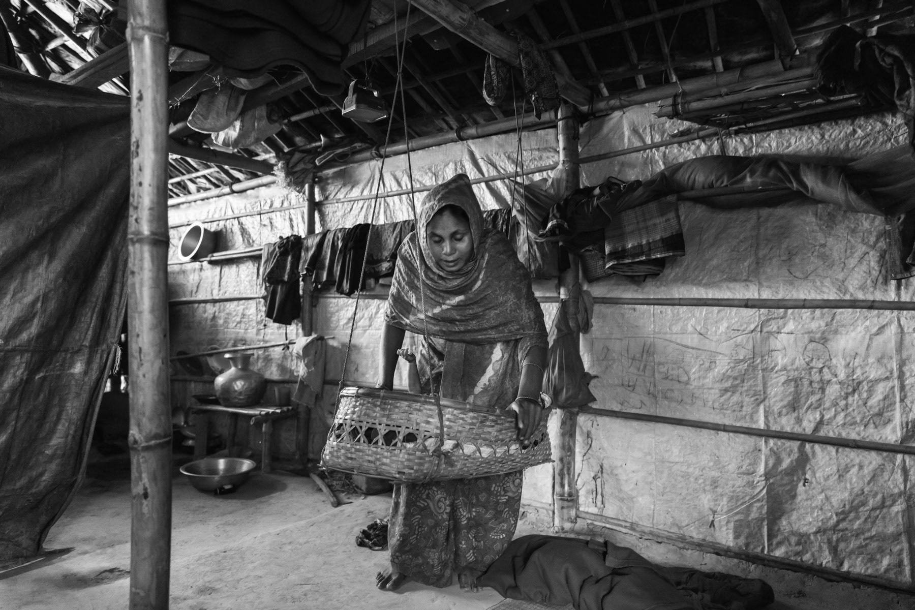 Moria Khatun and her new born son is from Maungdaw township in Myanmar and a victim of sexual abuse. She was tortured, blindfolded, tightened and gang raped for 4 hours by military and local Rakhine. After the military left the village, her husband who was hiding in the jungle, came to evacuate her. Nuru Hafez the little baby boy was born in June 2018 nine months after she had been raped. Balukhali refugee camp in Bangladesh, October 2018